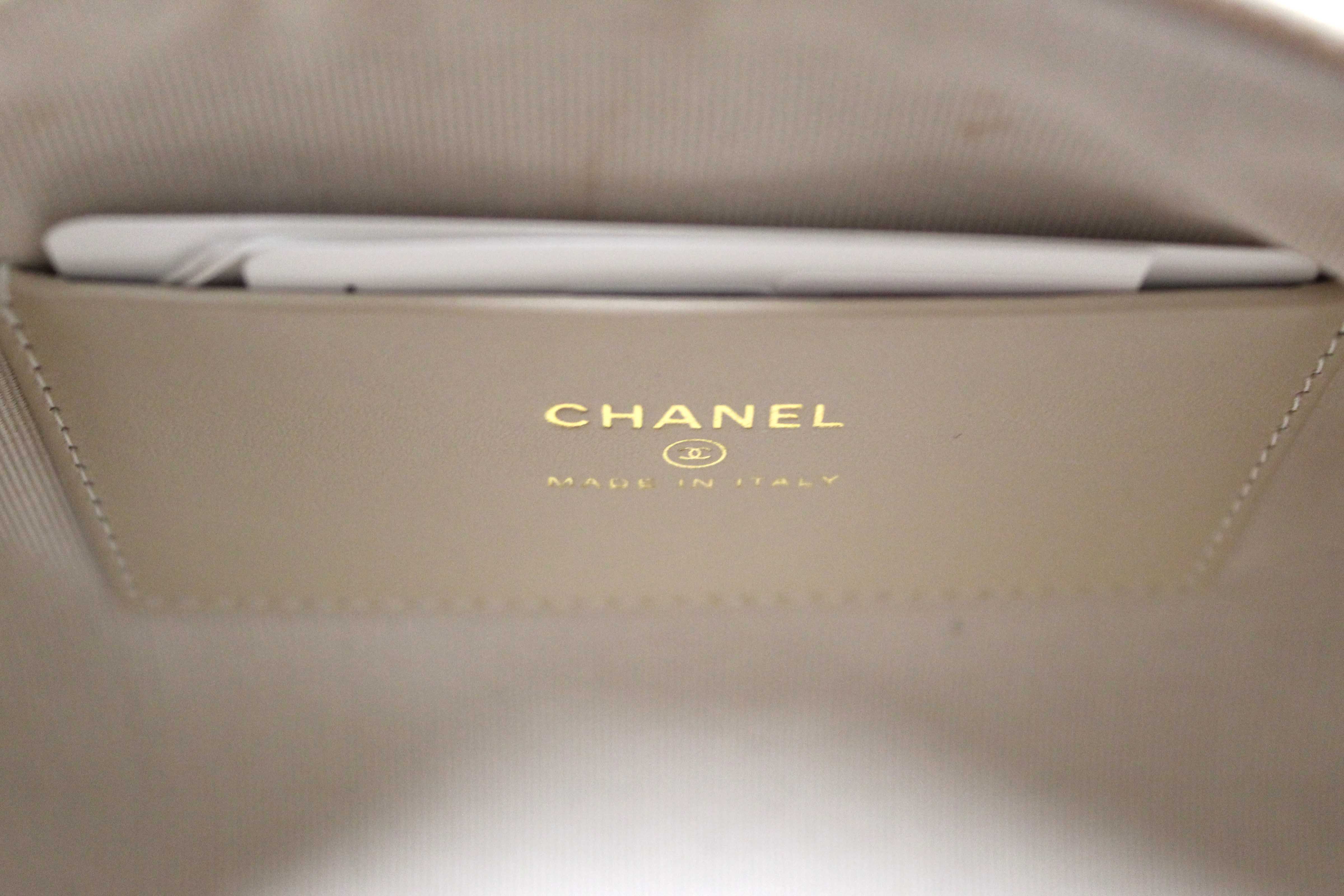 Authentic Chanel Beige Quilted Caviar Leather Mini Bowling with Chain Bag