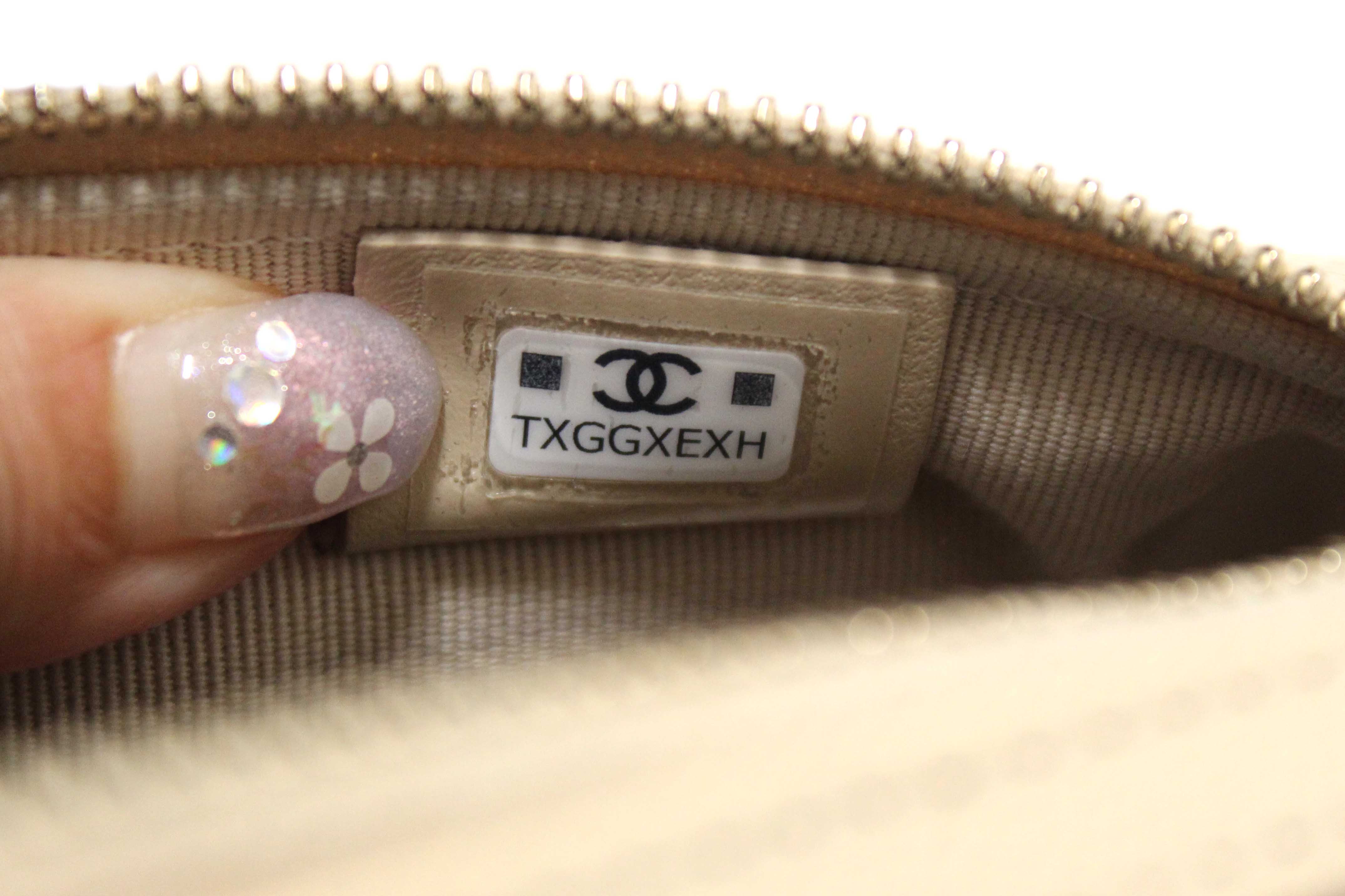 Authentic Chanel Beige Quilted Caviar Leather Mini Bowling with Chain Bag