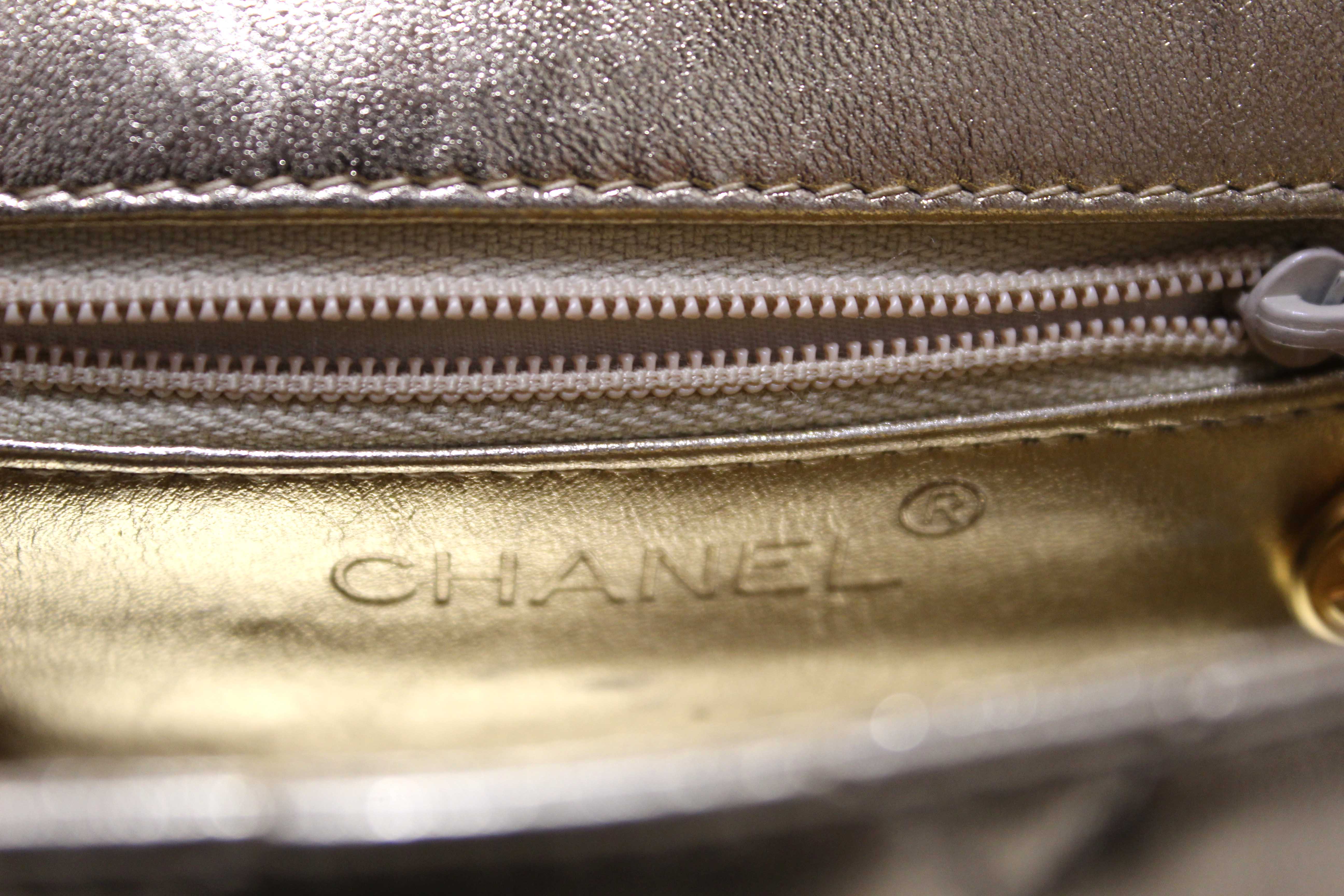 Authentic Chanel Vintage Gold Metallic Quilted Lambskin Leather Multi Chain CC Mini Round Flap Bag