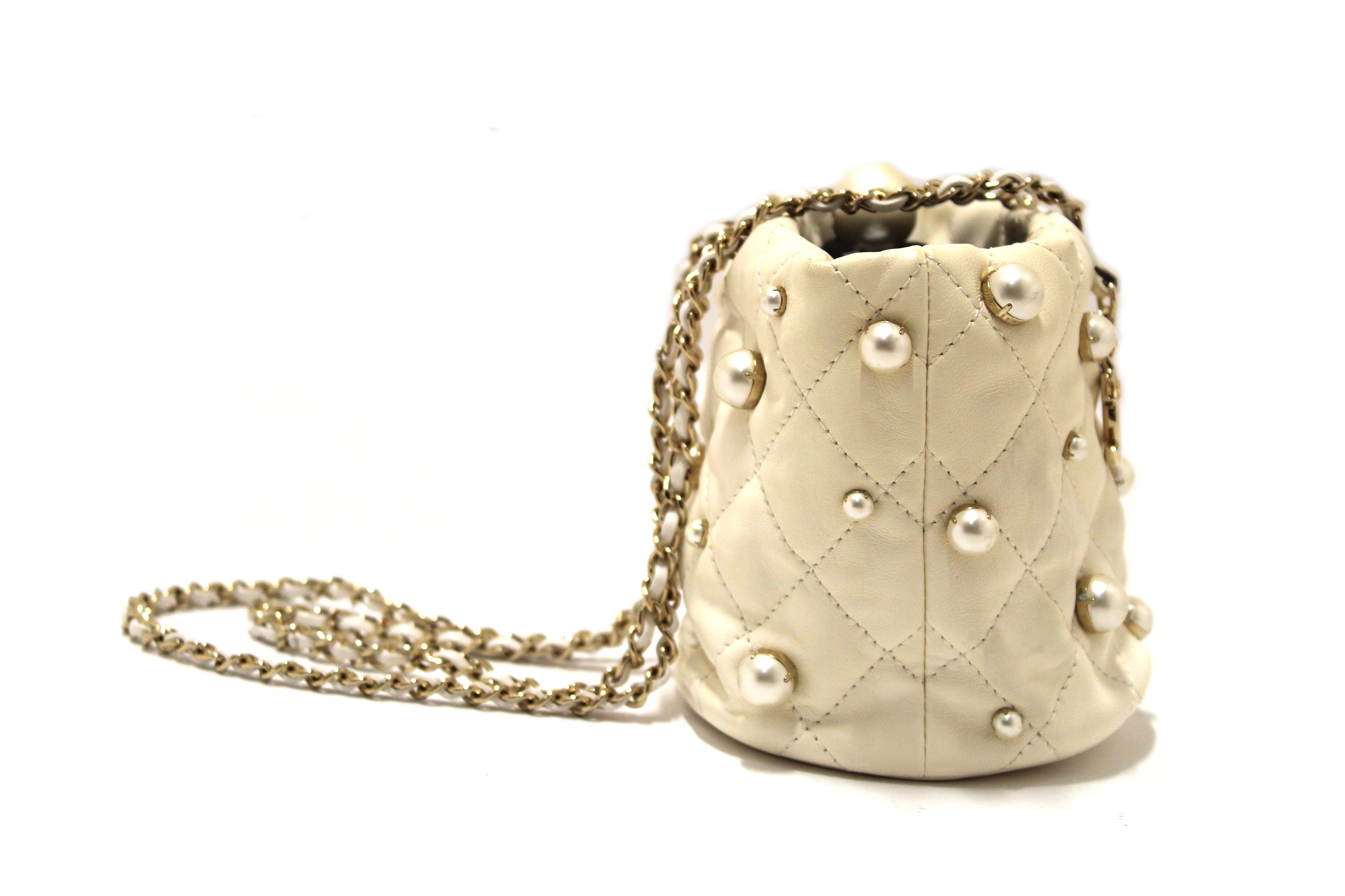 Authentic Chanel Quilted Lambskin with Pearls Mini Drawstring Bucket Bag