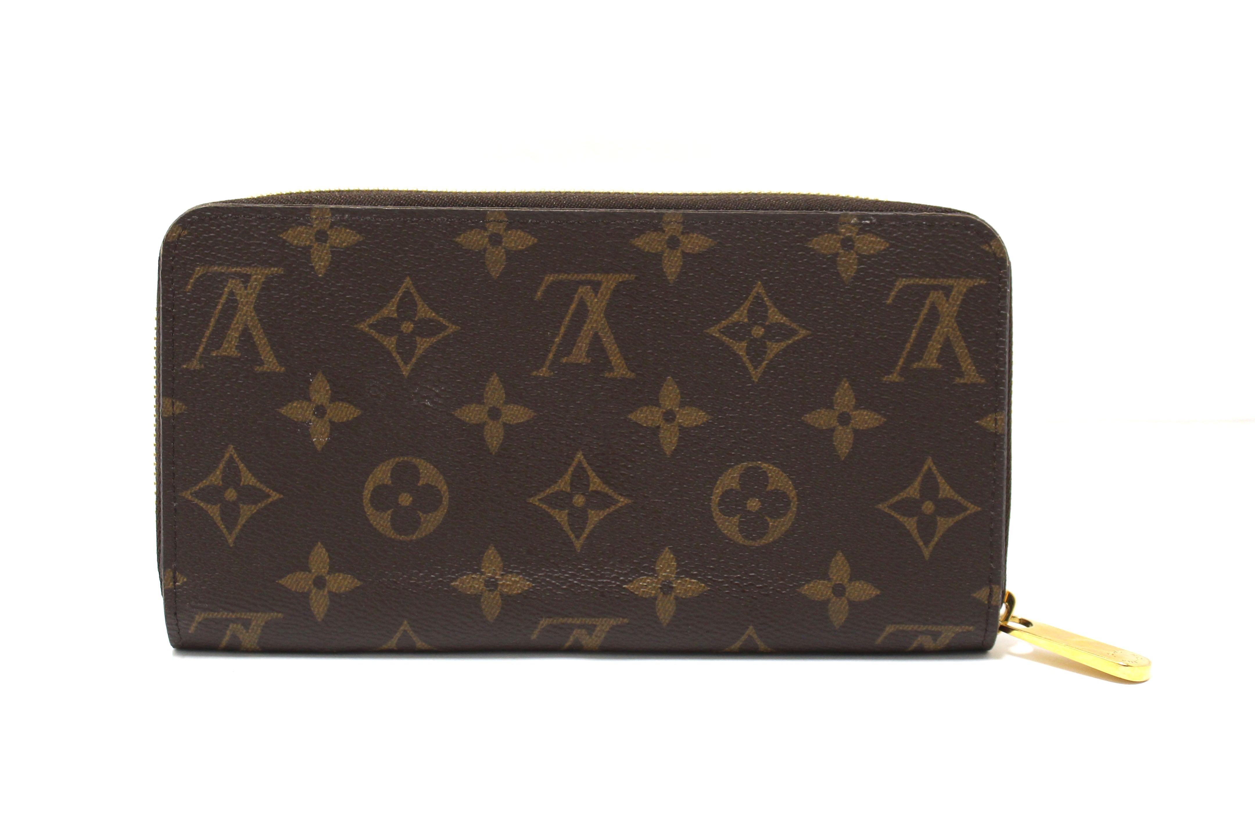 Authentic Louis Vuitton Classic Monogram with Fuchsia Zippy Wallet