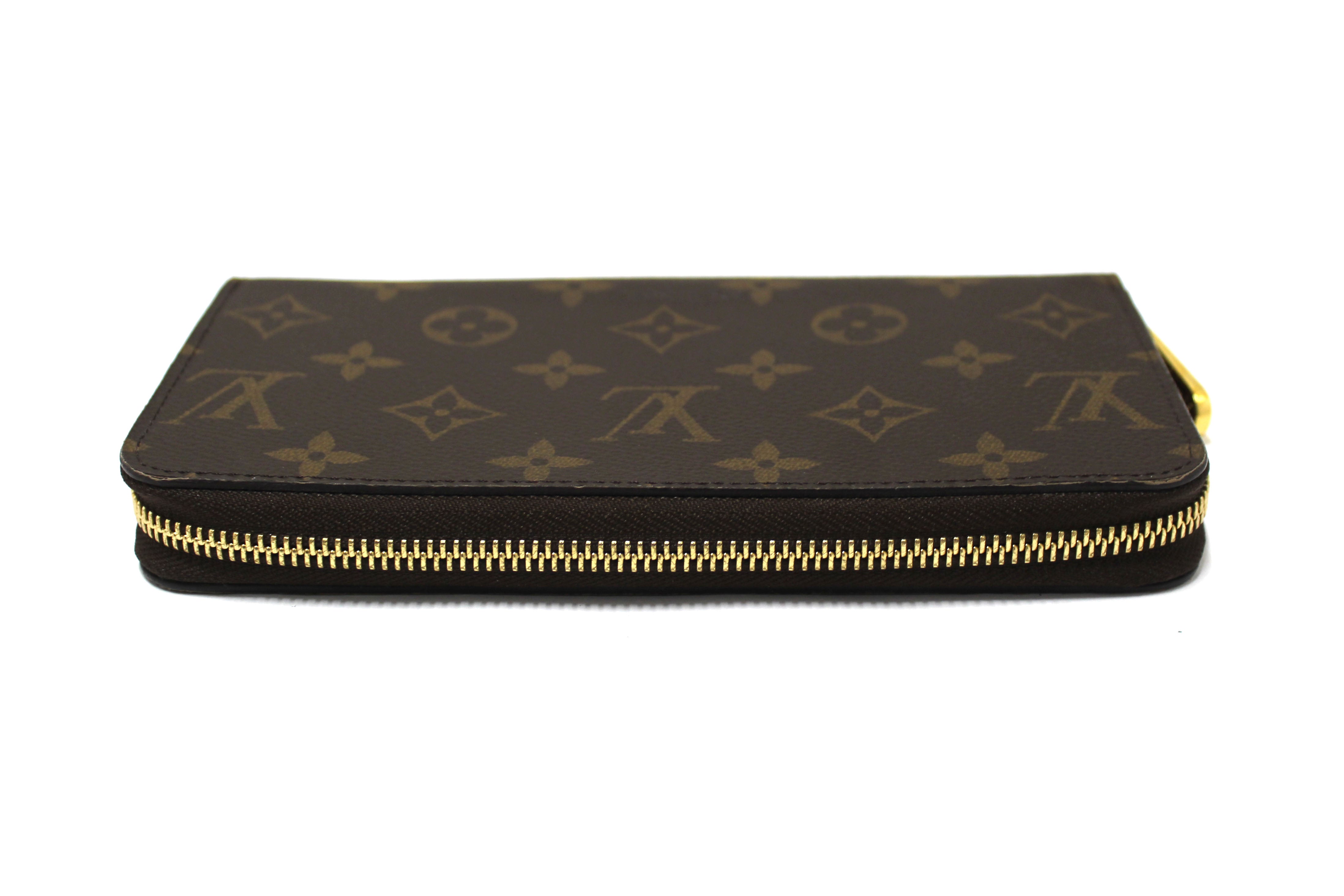 Authentic Louis Vuitton Classic Monogram with Fuchsia Zippy Wallet