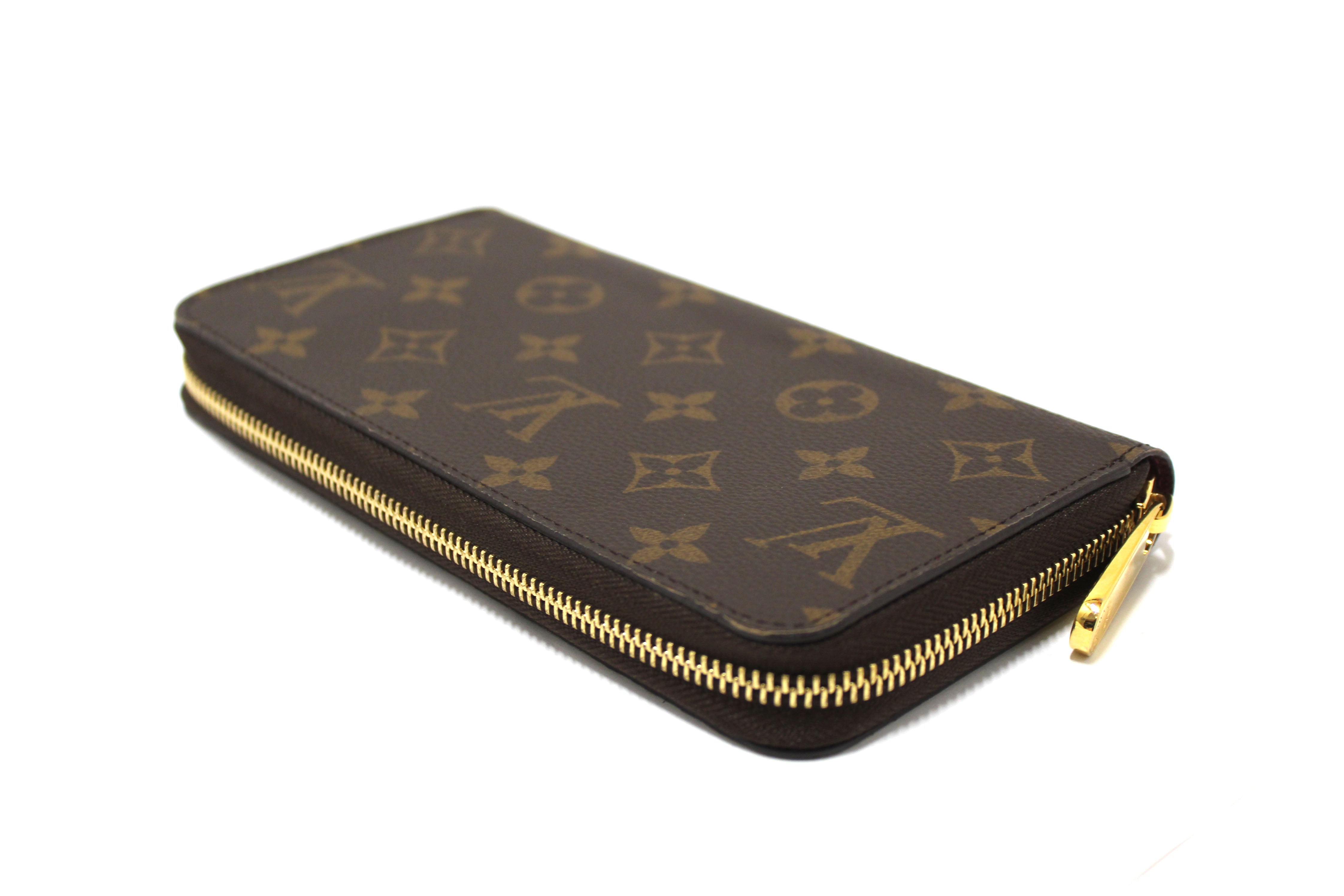 Authentic Louis Vuitton Classic Monogram with Fuchsia Zippy Wallet