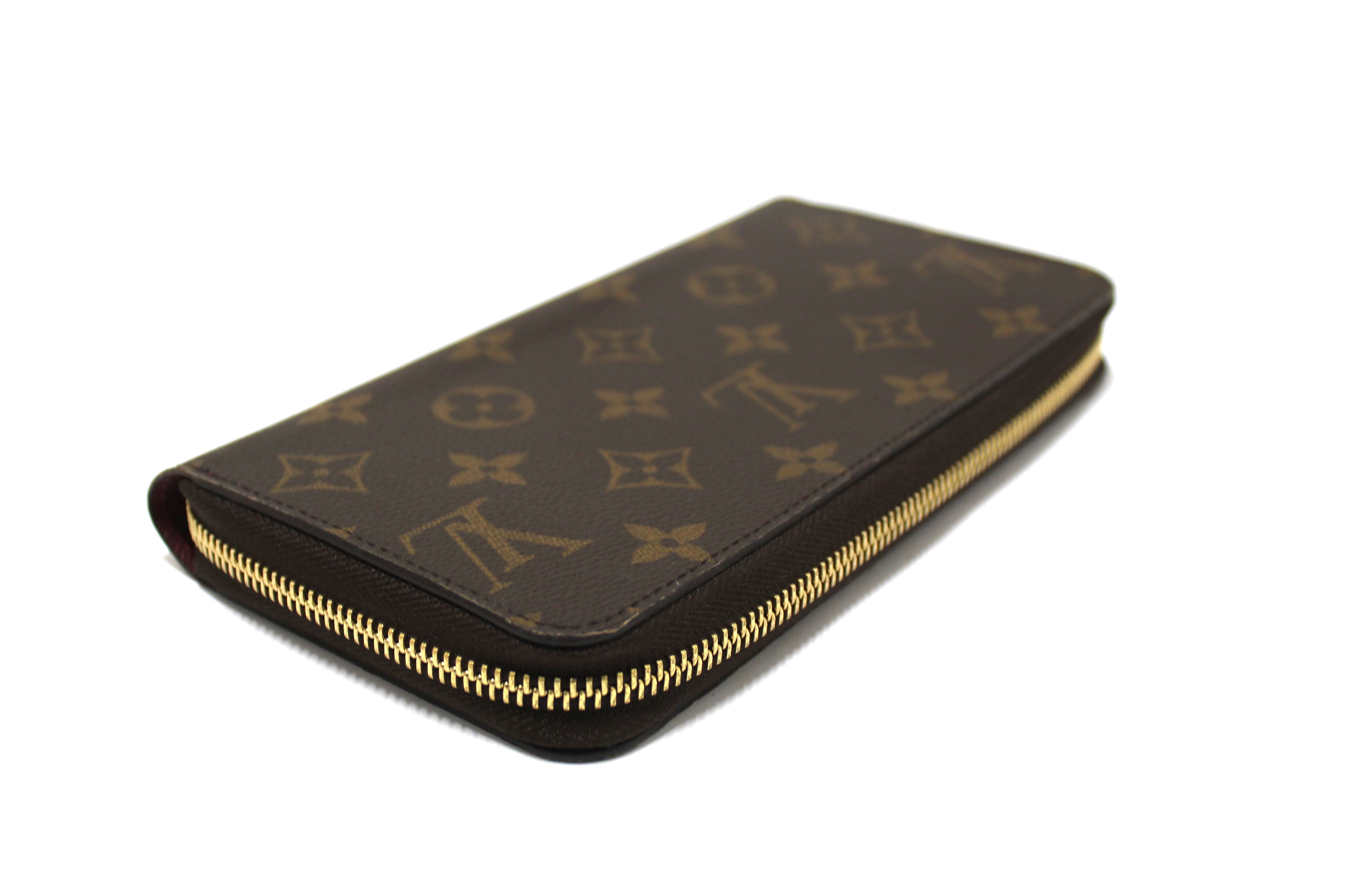 Authentic Louis Vuitton Classic Monogram with Fuchsia Zippy Wallet