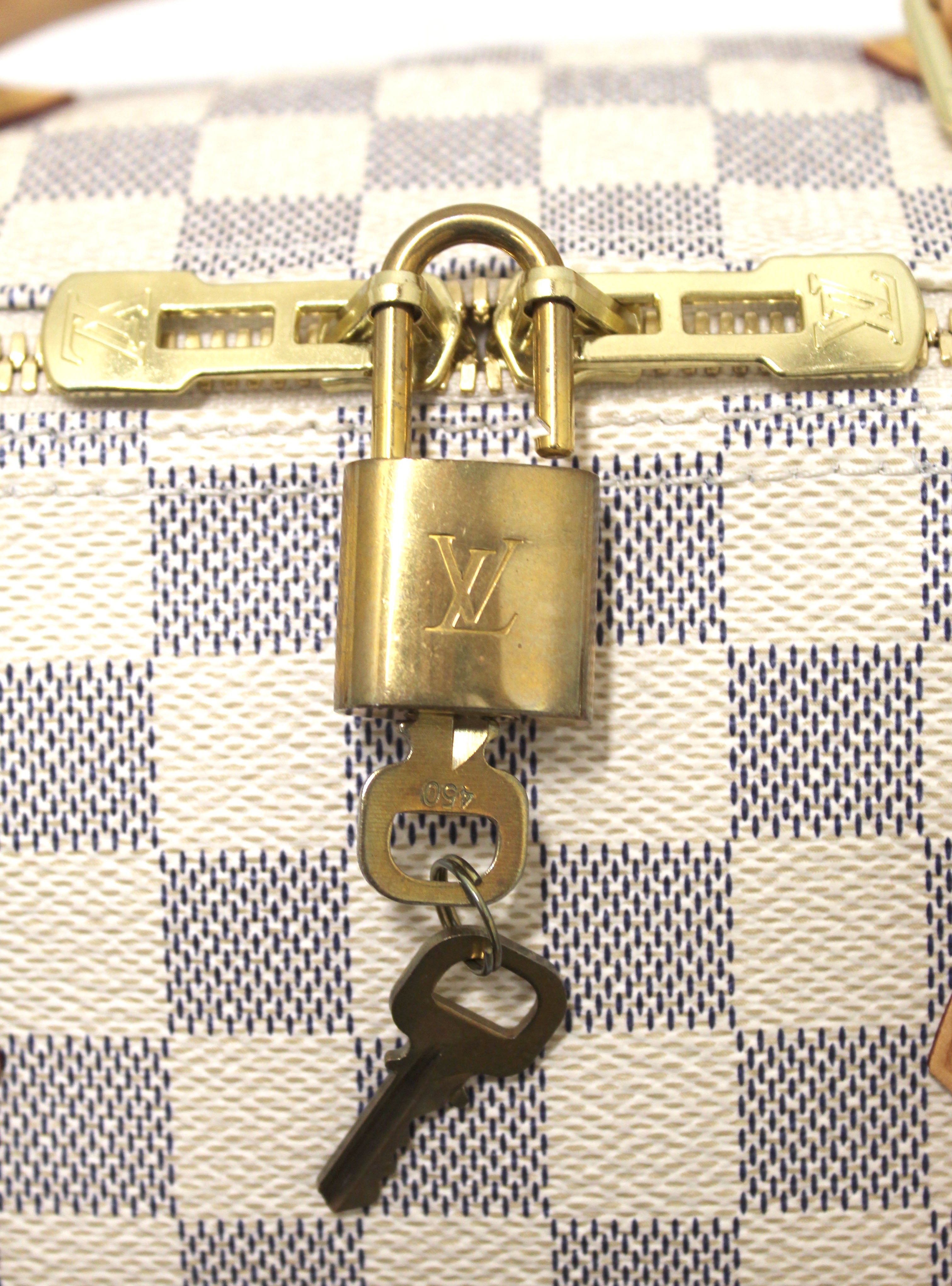 SOLDDDDDLouis Vuitton Speedy 30 lock key box bag