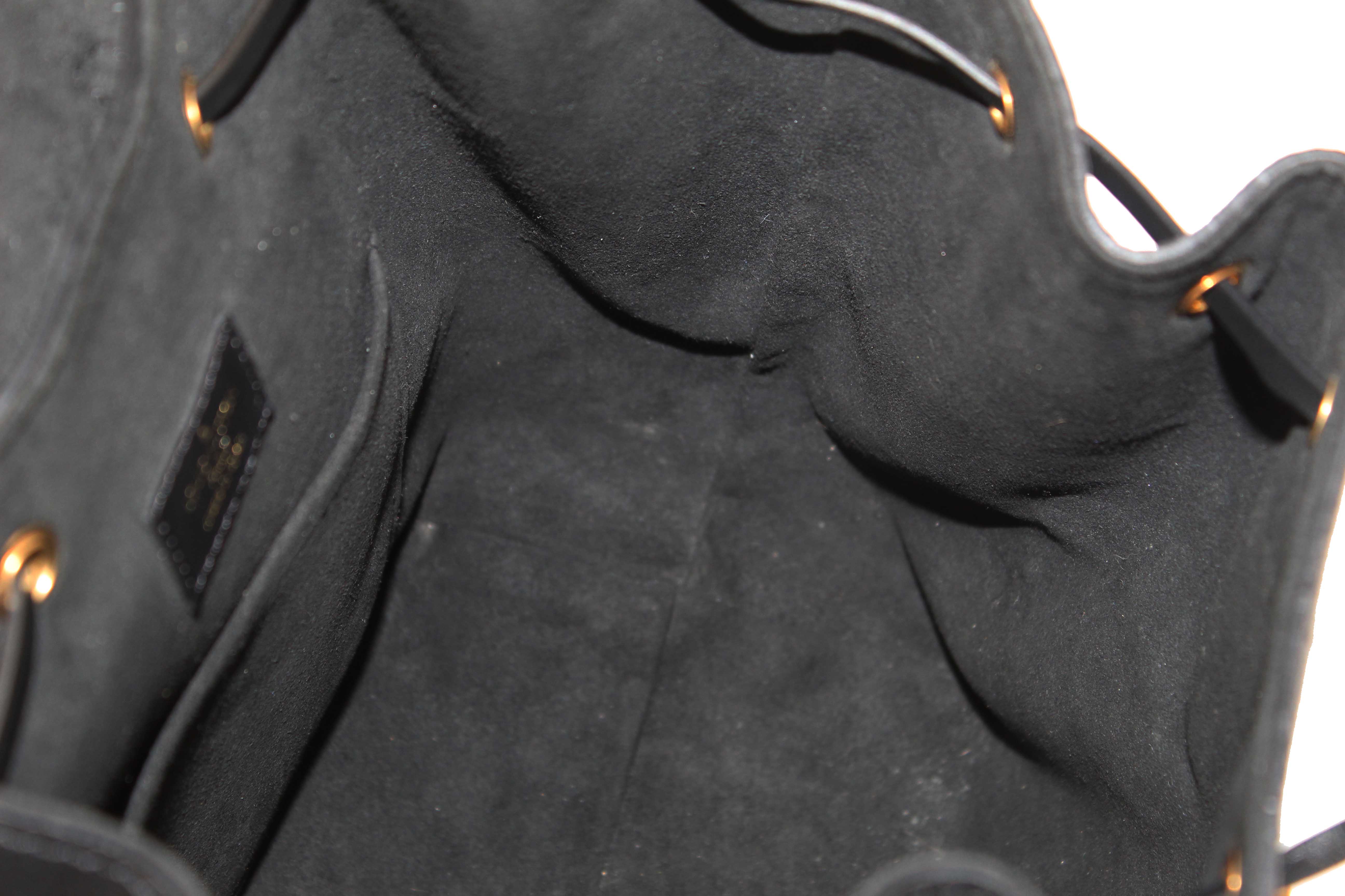 Authentic Louis Vuitton Black Monogram Empreinte Montsouris Backpack
