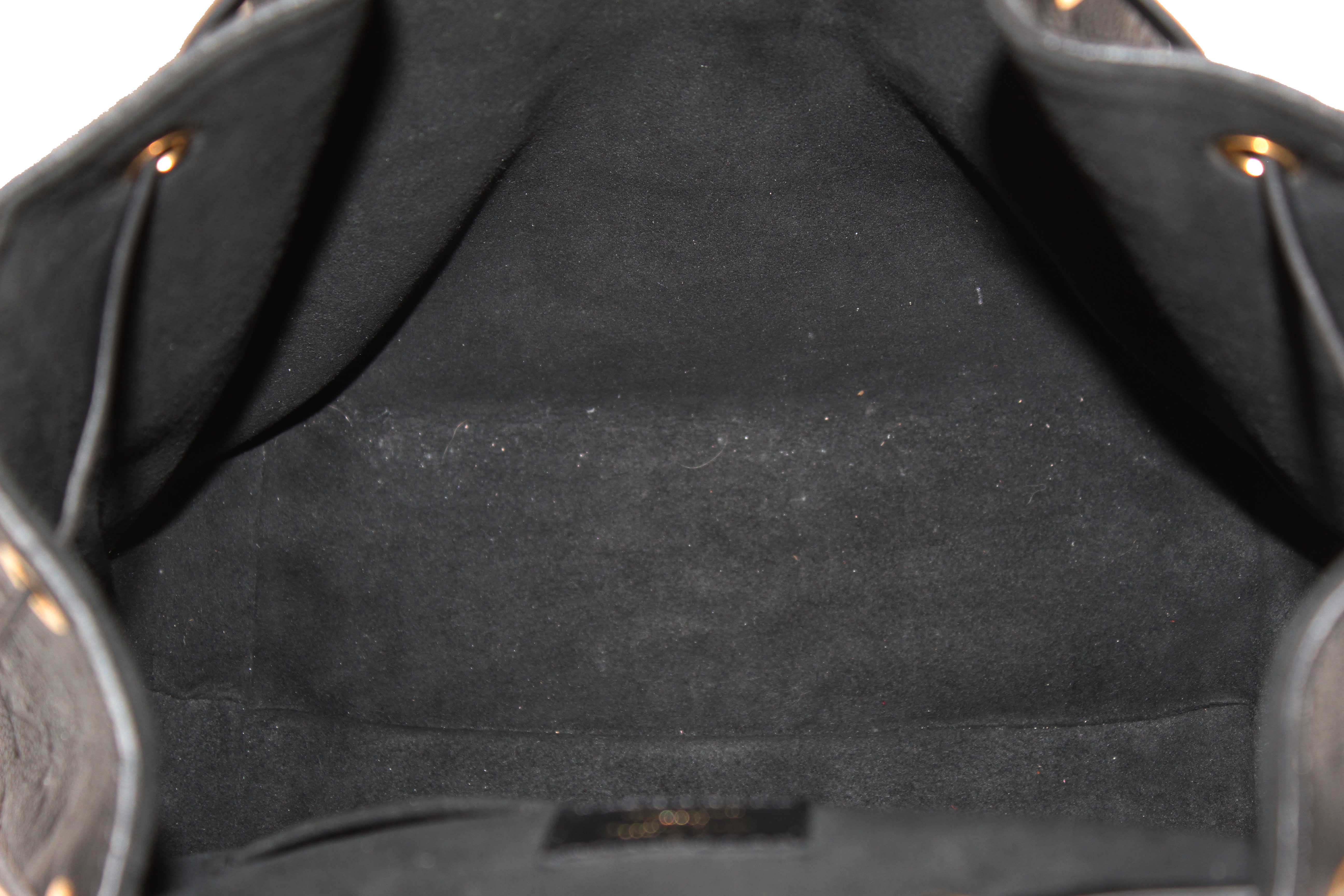 Authentic Louis Vuitton Black Monogram Empreinte Montsouris Backpack