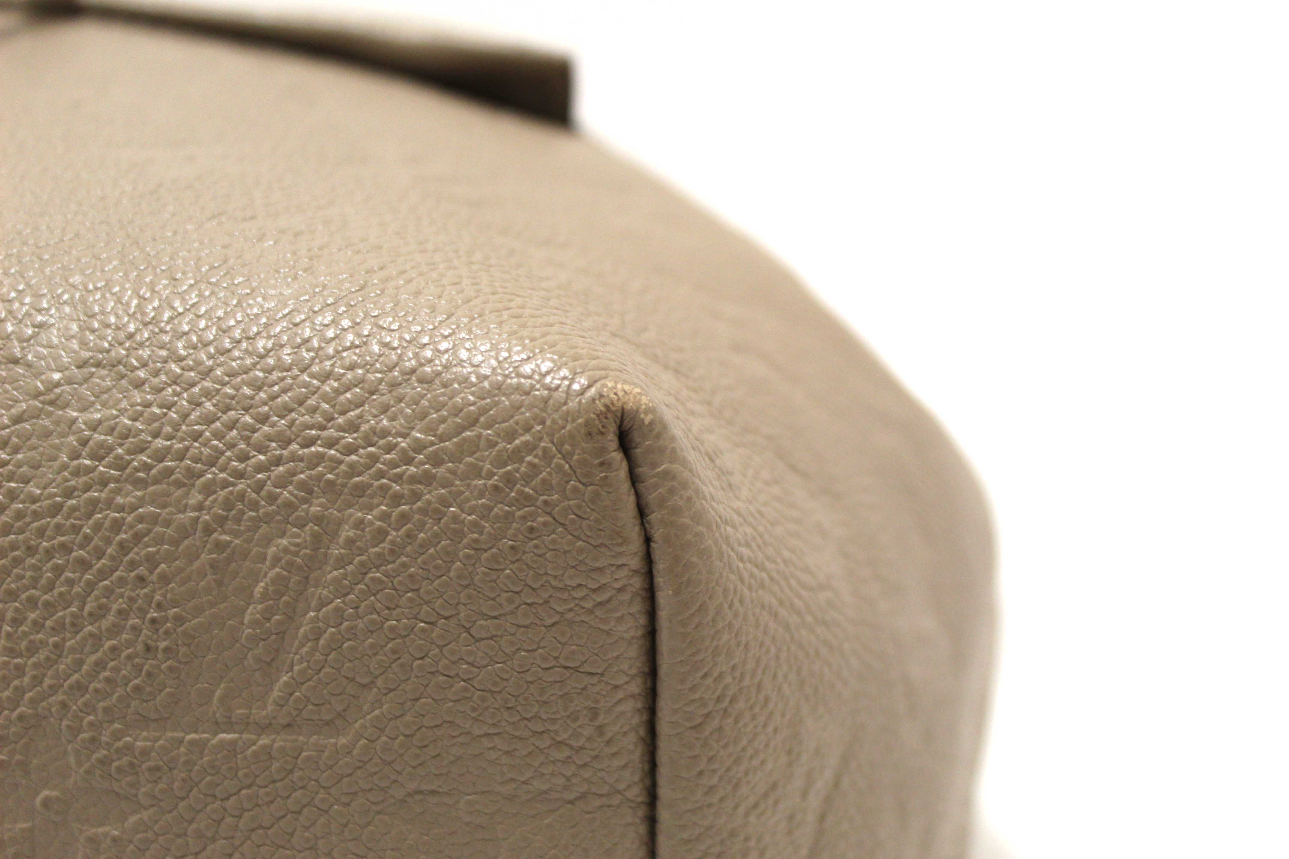 Authentic Louis Vuitton Turtledove Monogram Empreinte Montsouris Backpack