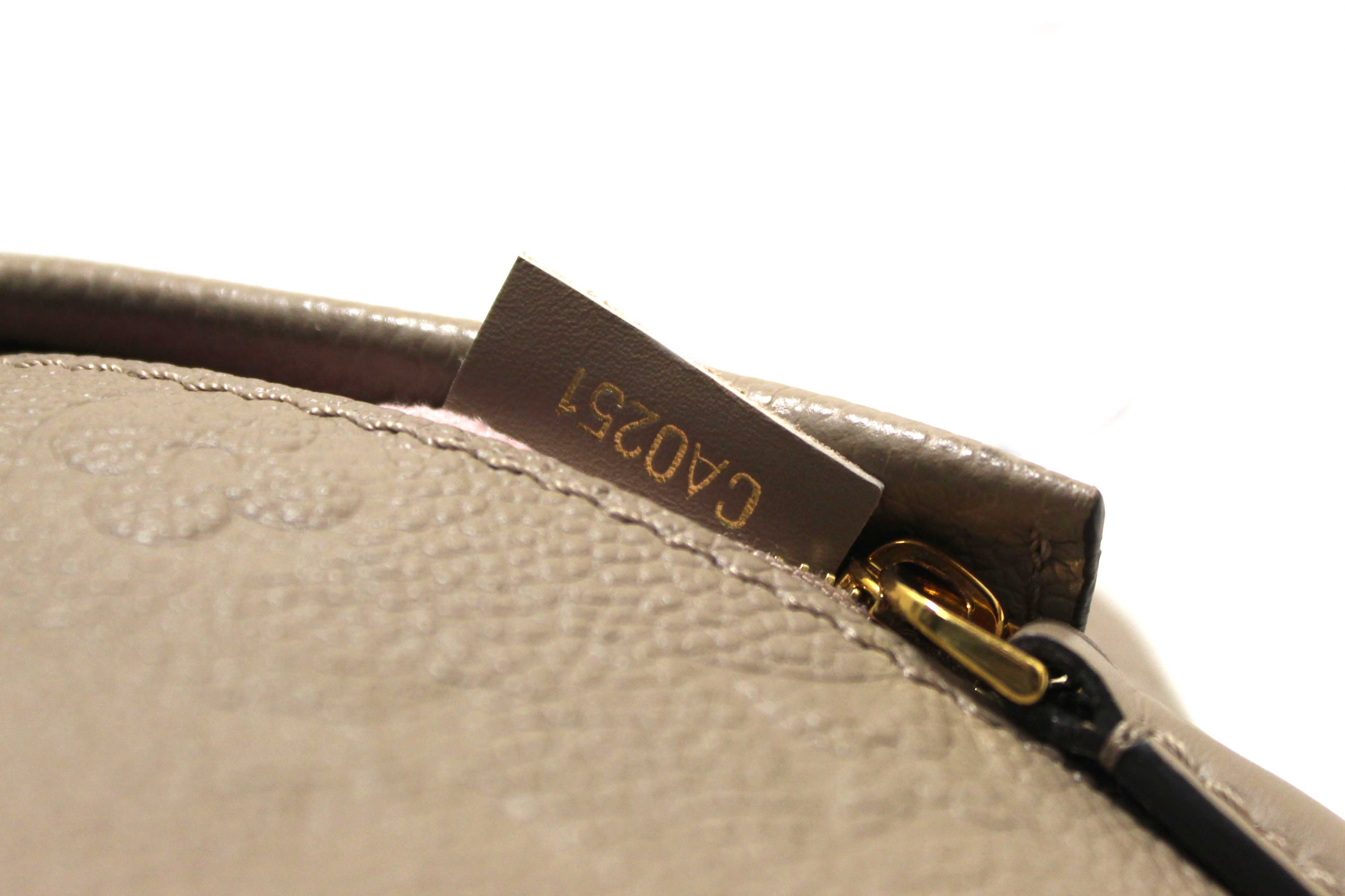 Authentic Louis Vuitton Turtledove Monogram Empreinte Montsouris Backpack