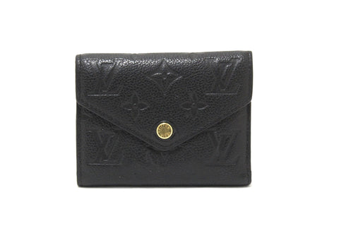 Authentic Louis Vuitton Black Monogram Empreinte Leather Victorine Wallet