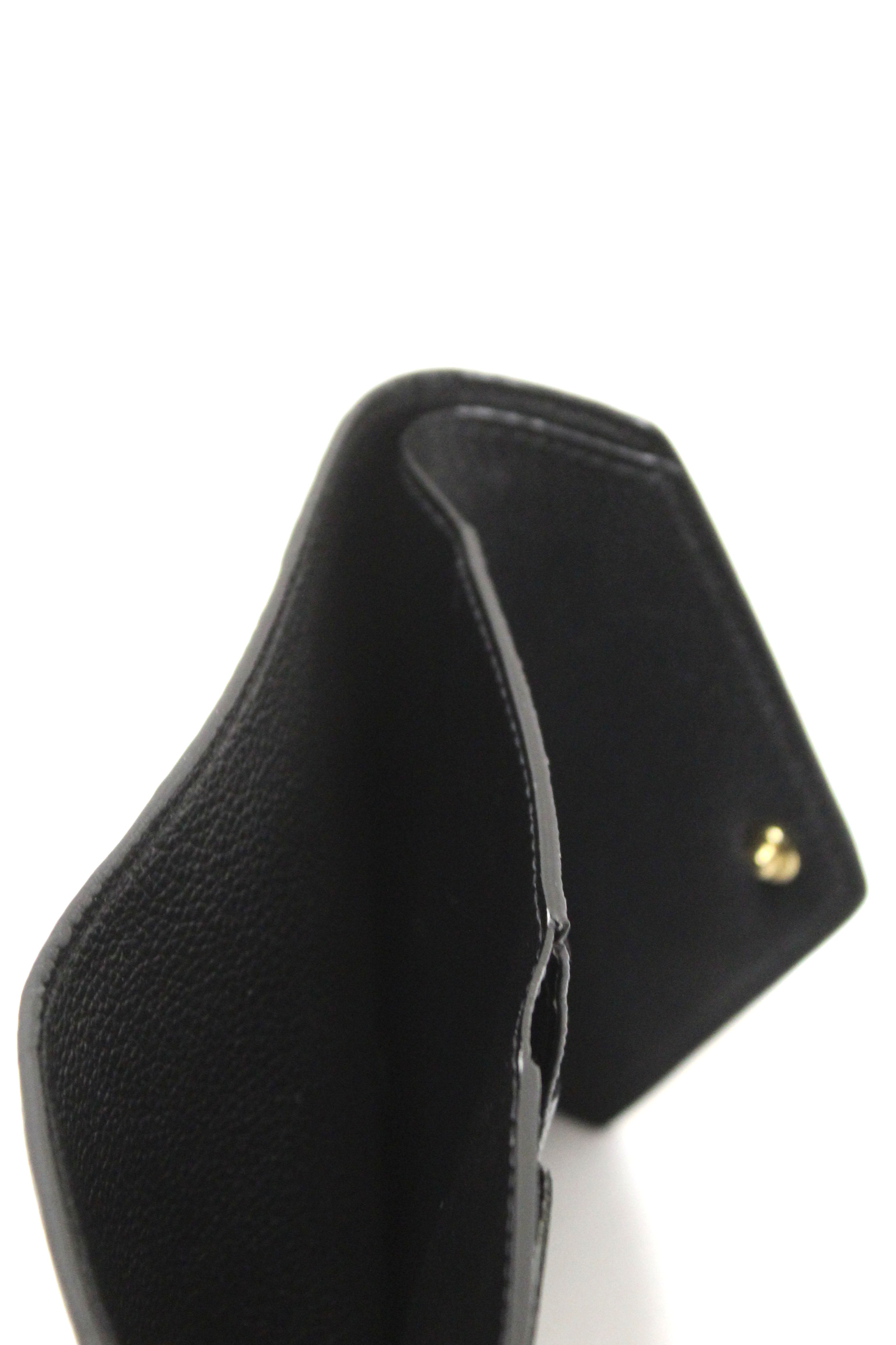 Authentic Louis Vuitton Black Monogram Empreinte Leather Victorine Wallet