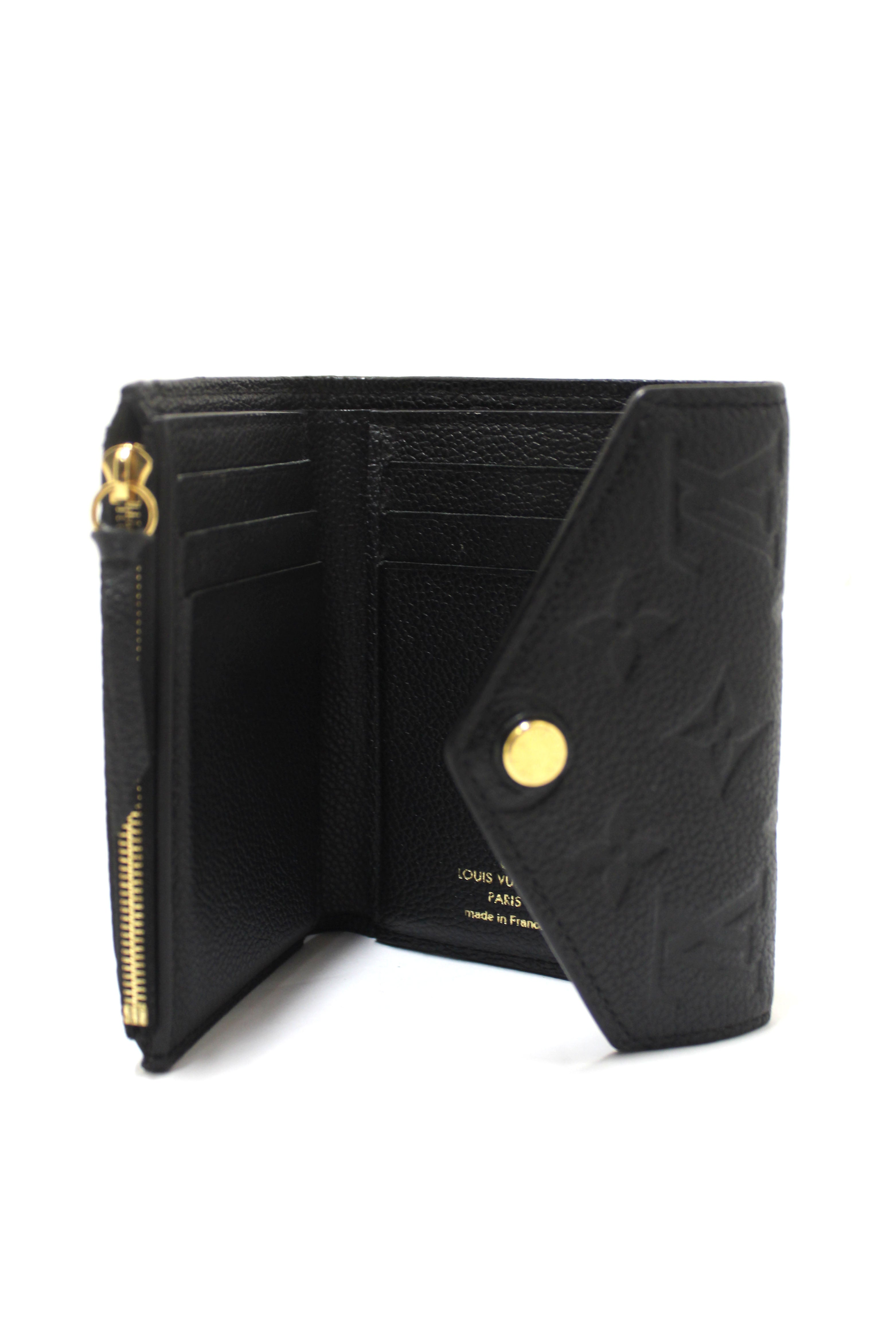 Authentic Louis Vuitton Black Monogram Empreinte Leather Victorine Wallet