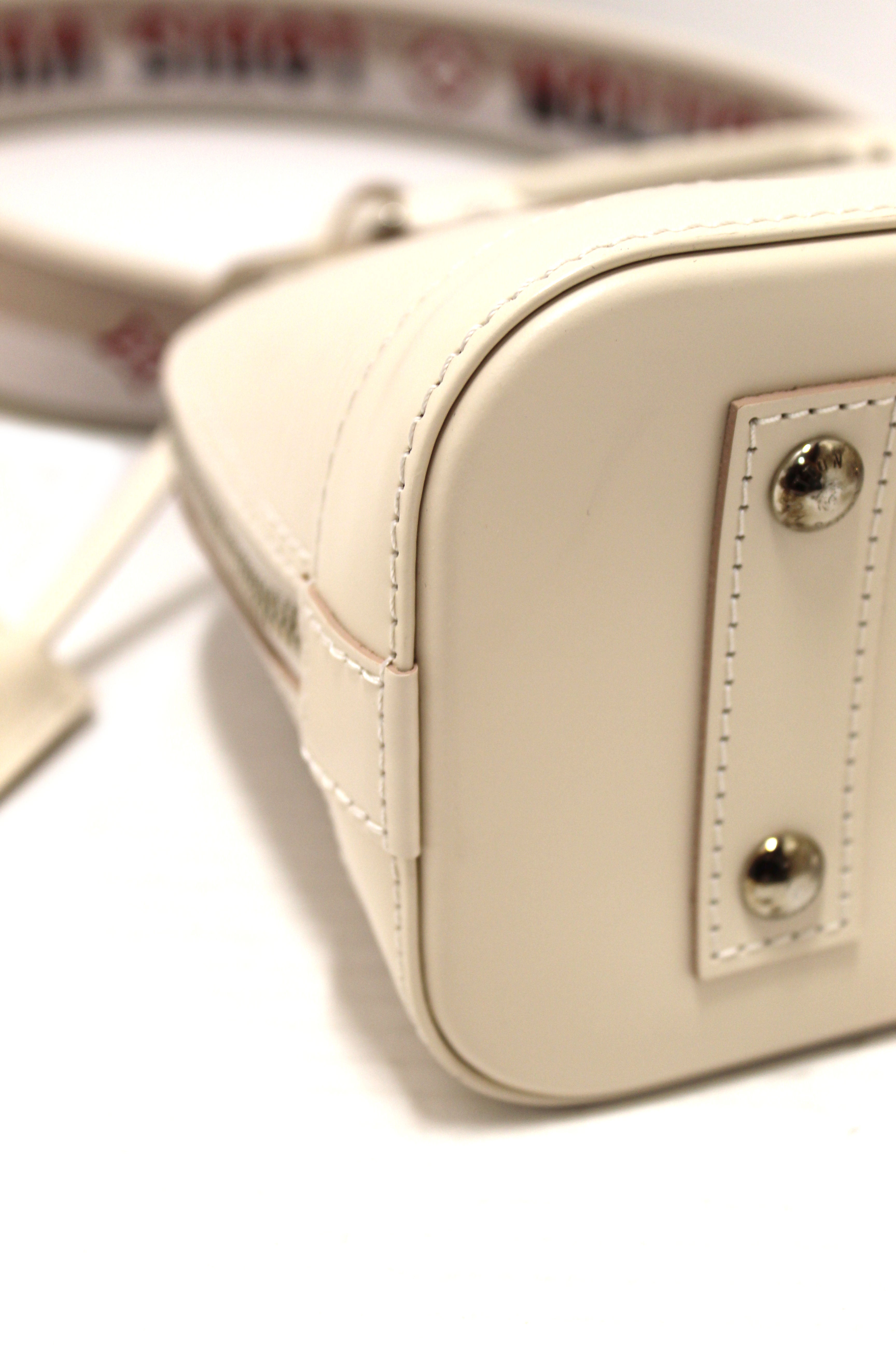 Authentic Louis Vuitton Quartz White Leather Alma BB Hand/Crossbody Bag