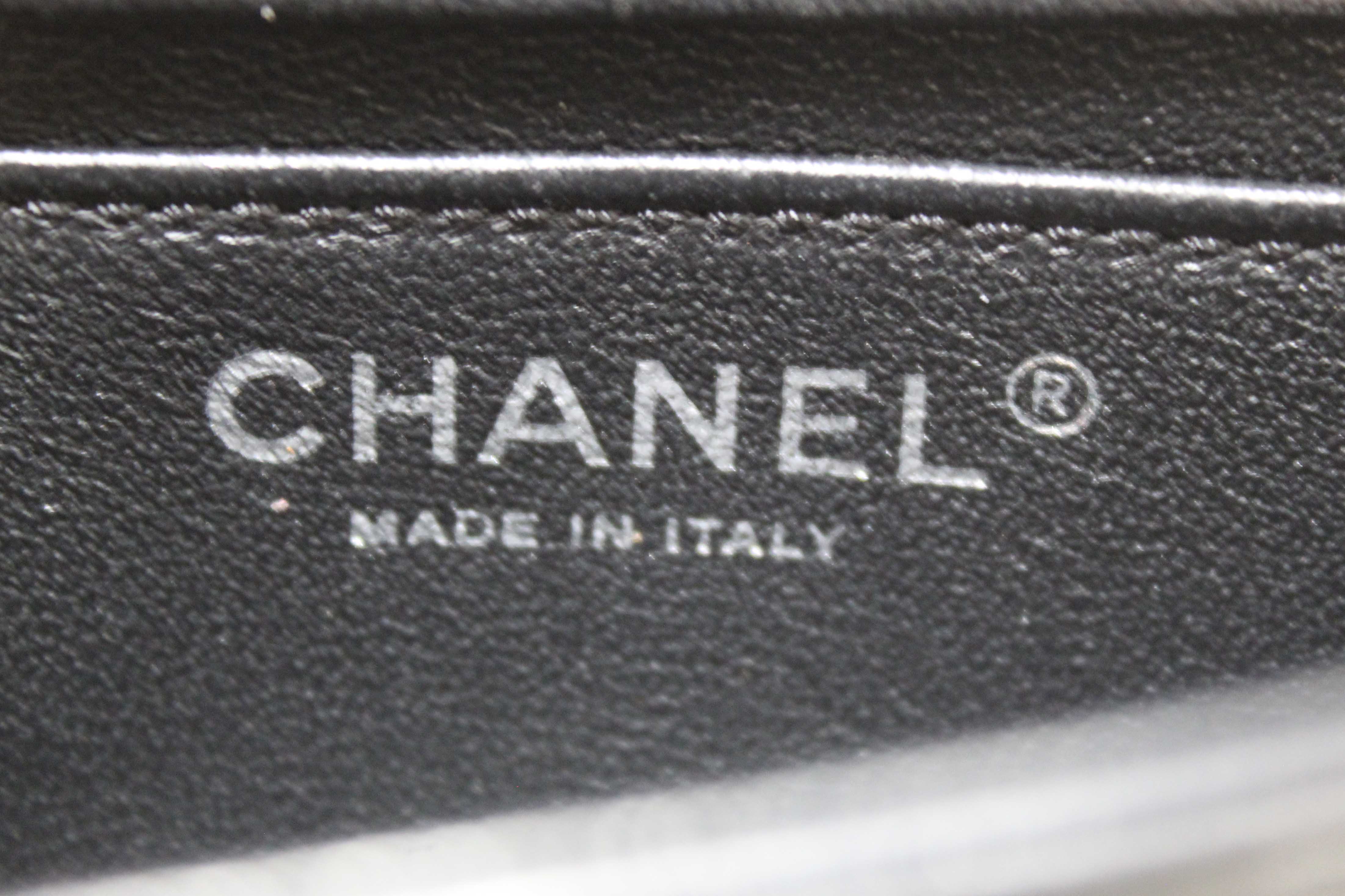 Authentic Chanel Interlaced Chain Strap Braided Black Lambskin Leather and Resin Mini Clutch