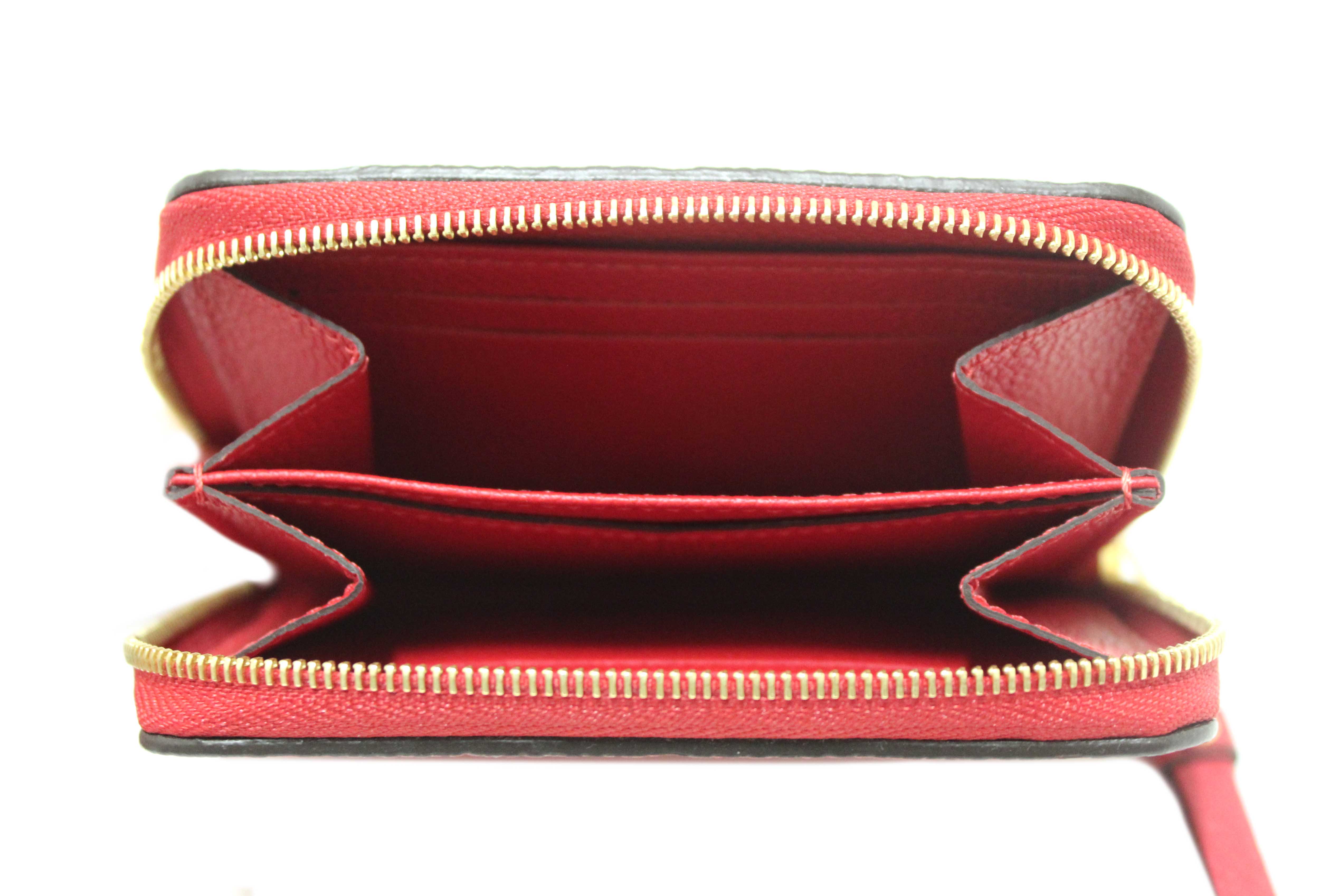 Authentic Louis Vuitton Red Monogram Empreinte Leather Zippy Coin Purse