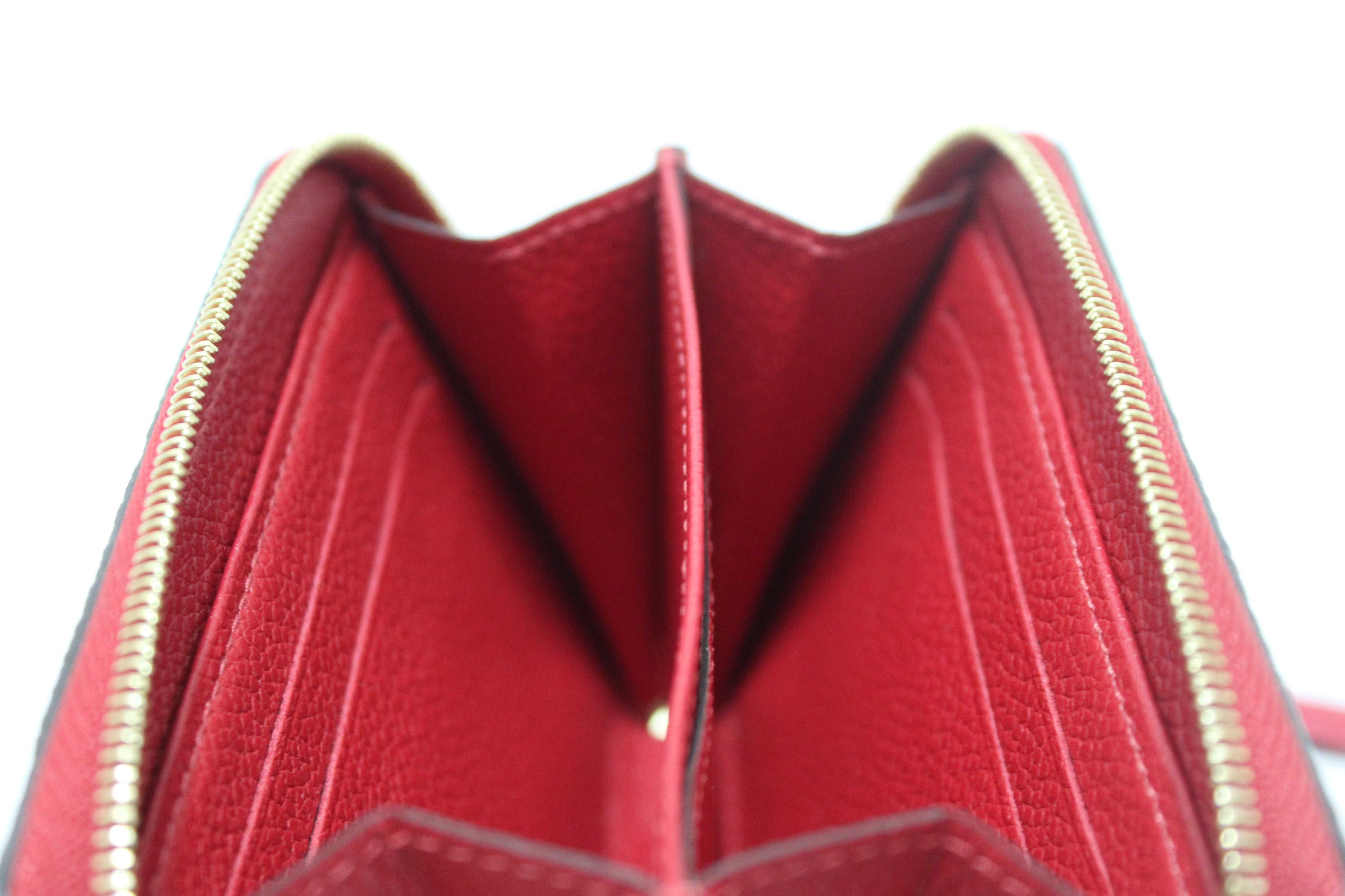 Authentic Louis Vuitton Red Monogram Empreinte Leather Zippy Coin Purse