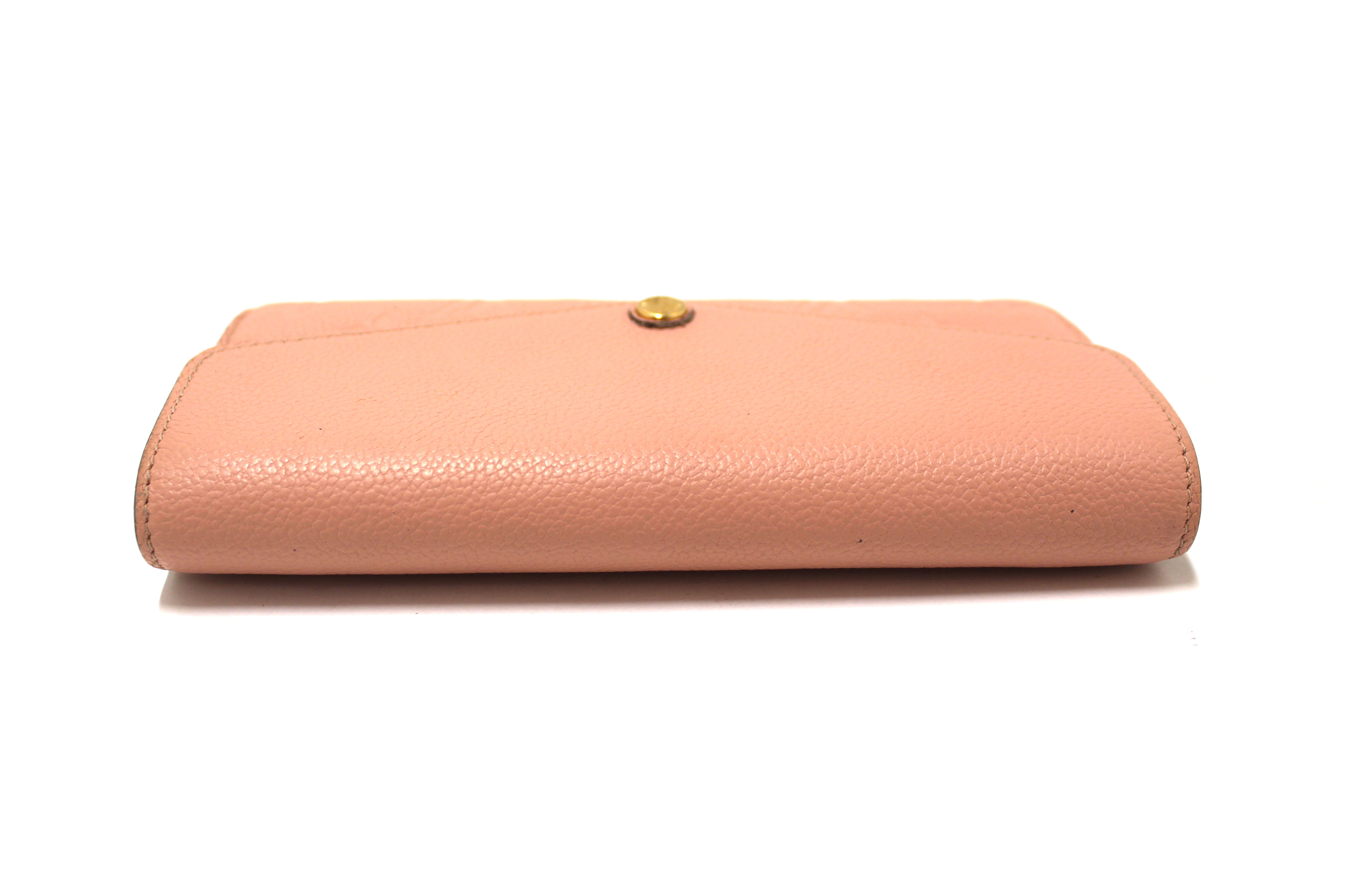 Authentic Louis Vuitton Pink Monogram Empreinte Leather Sarah Wallet