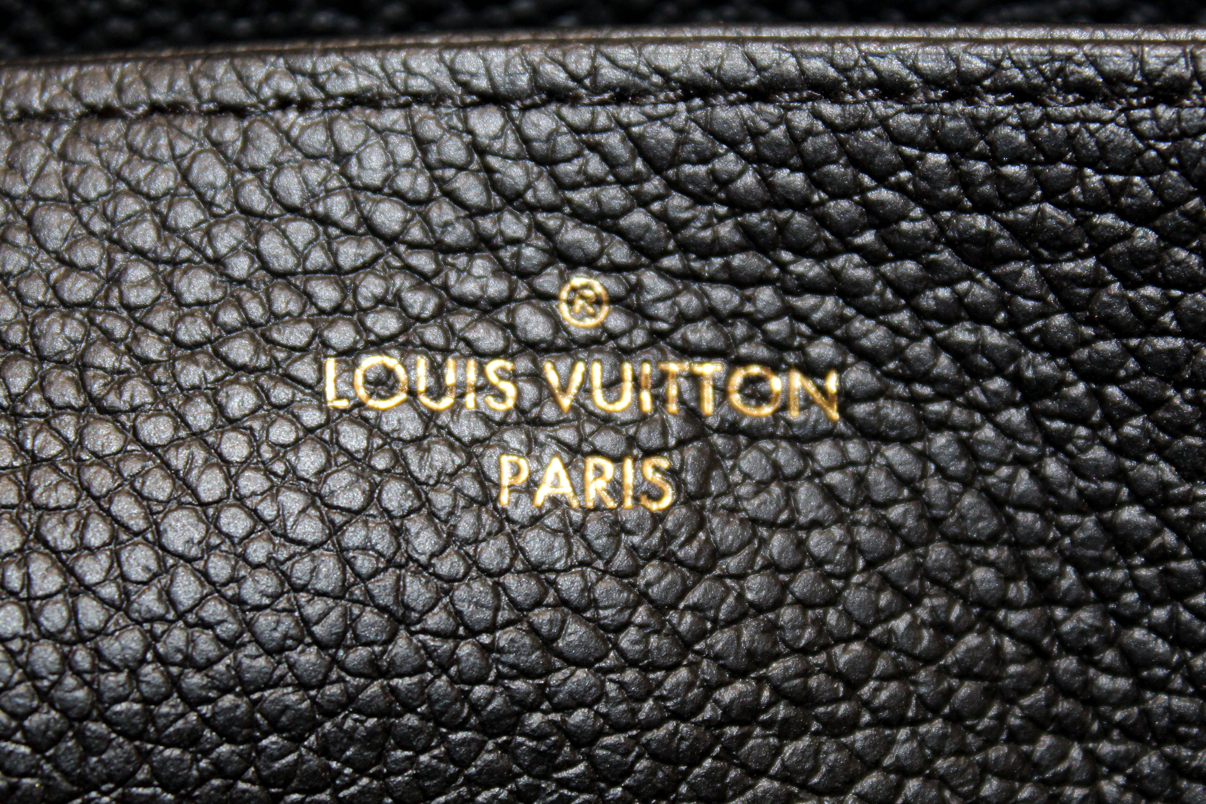 Authentic Louis Vuitton Black Monogram Empreinte Leather Zippy Wallet