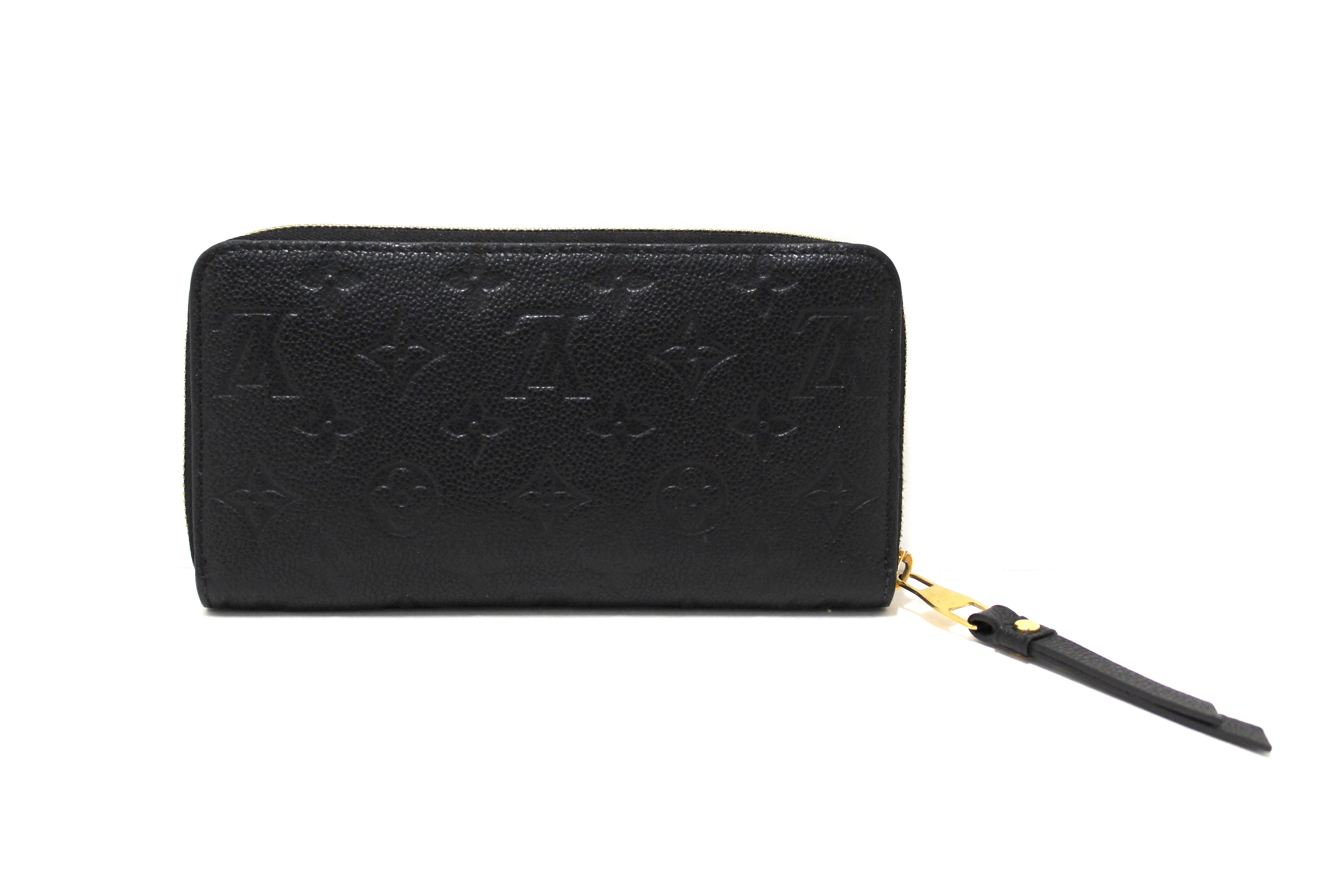 Authentic Louis Vuitton Black Monogram Empreinte Leather Zippy Wallet