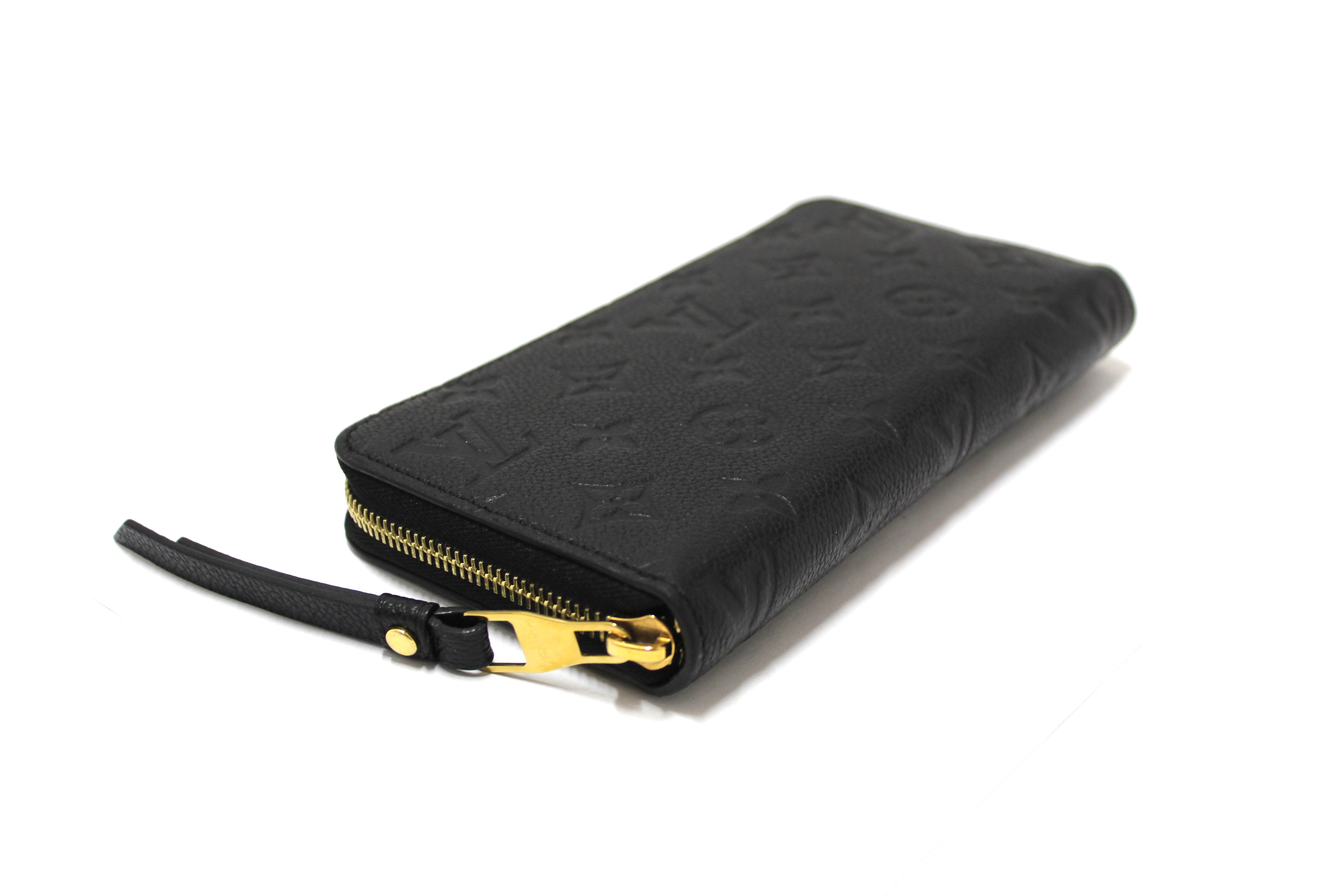 Authentic Louis Vuitton Black Monogram Empreinte Leather Zippy Wallet