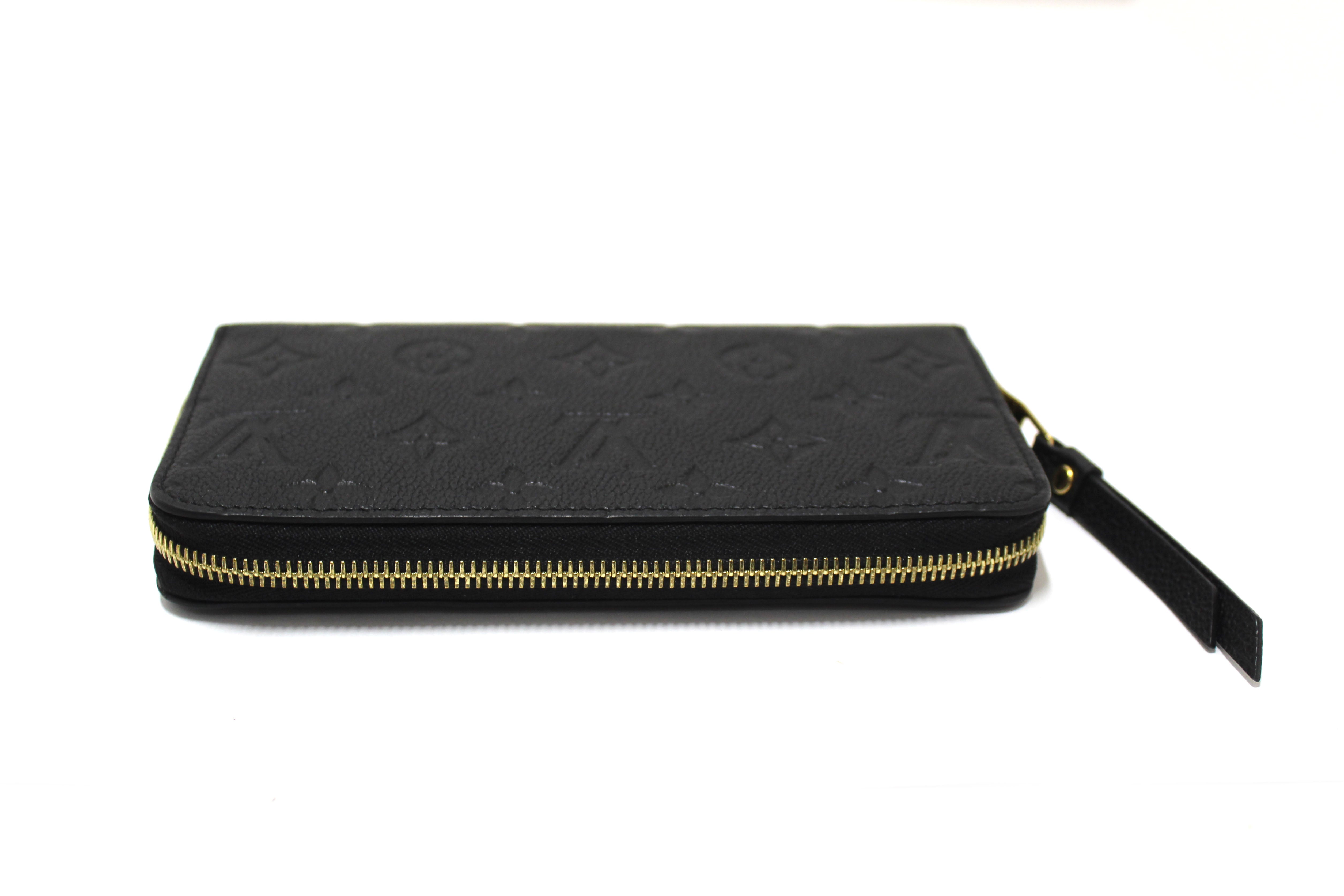 Authentic Louis Vuitton Black Monogram Empreinte Leather Zippy Wallet