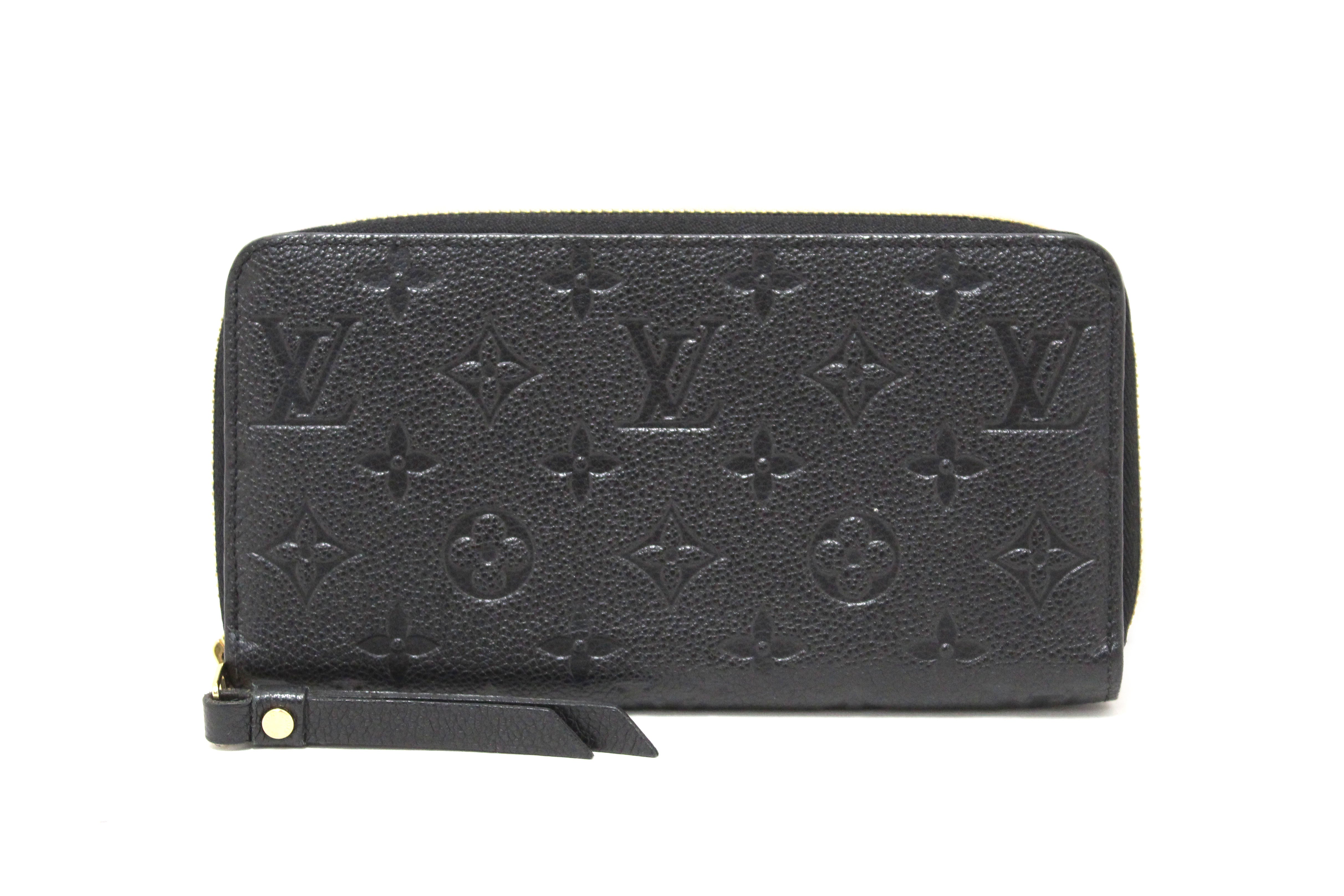 Authentic Louis Vuitton Black Monogram Empreinte Leather Zippy