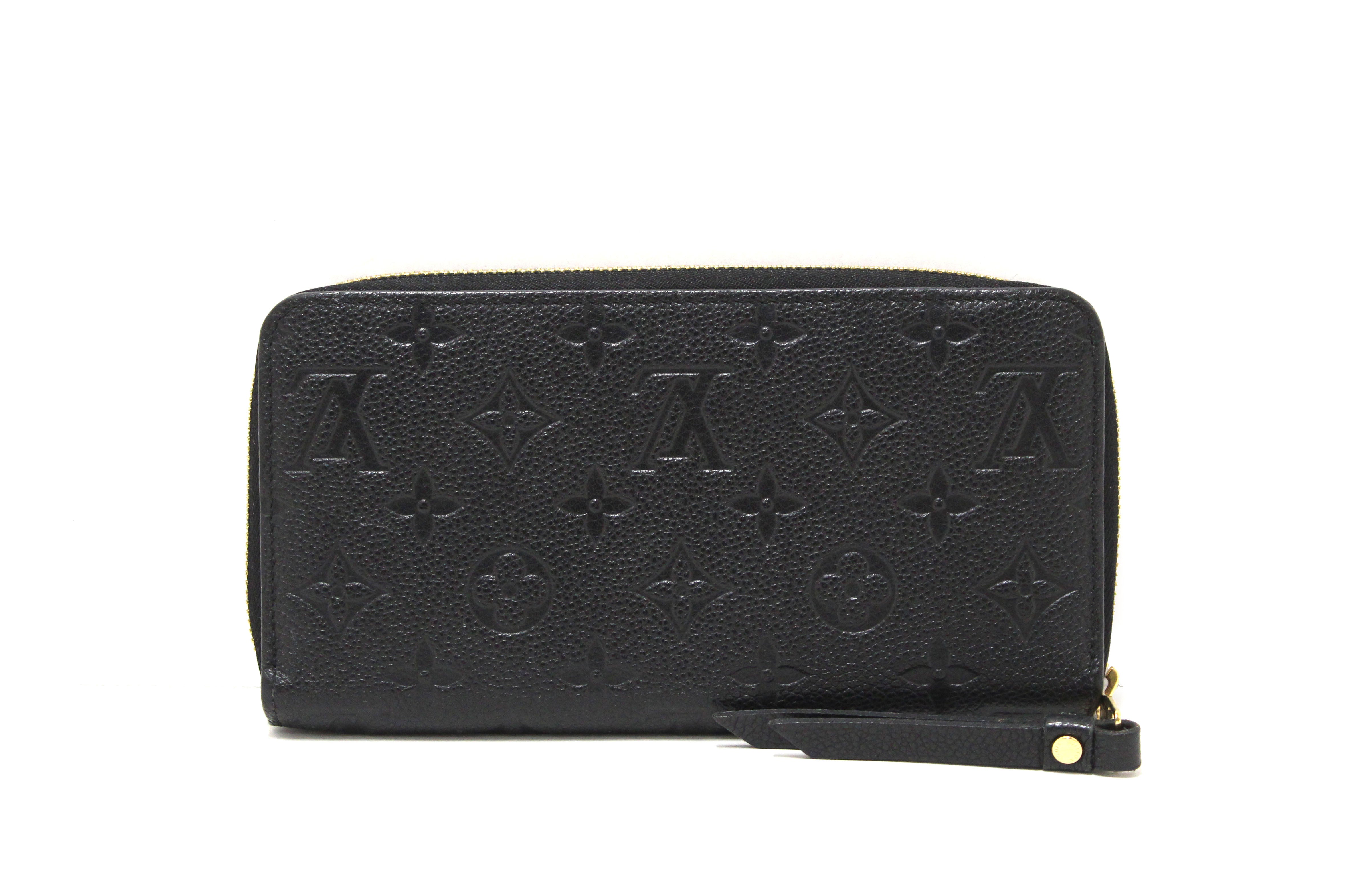 Authentic Louis Vuitton Black Monogram Empreinte Leather Zippy Wallet