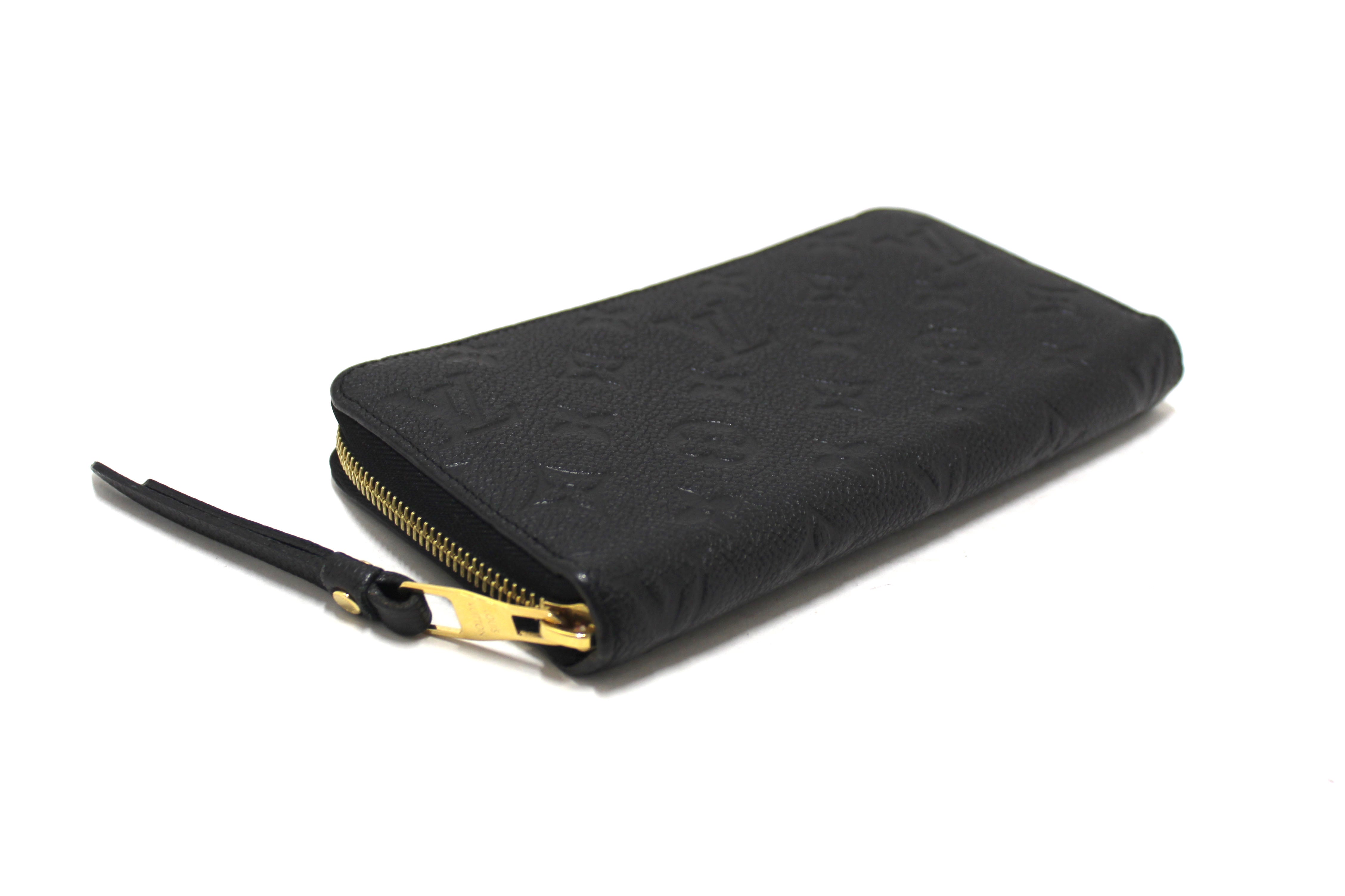 Authentic Louis Vuitton Black Monogram Empreinte Leather Zippy Wallet