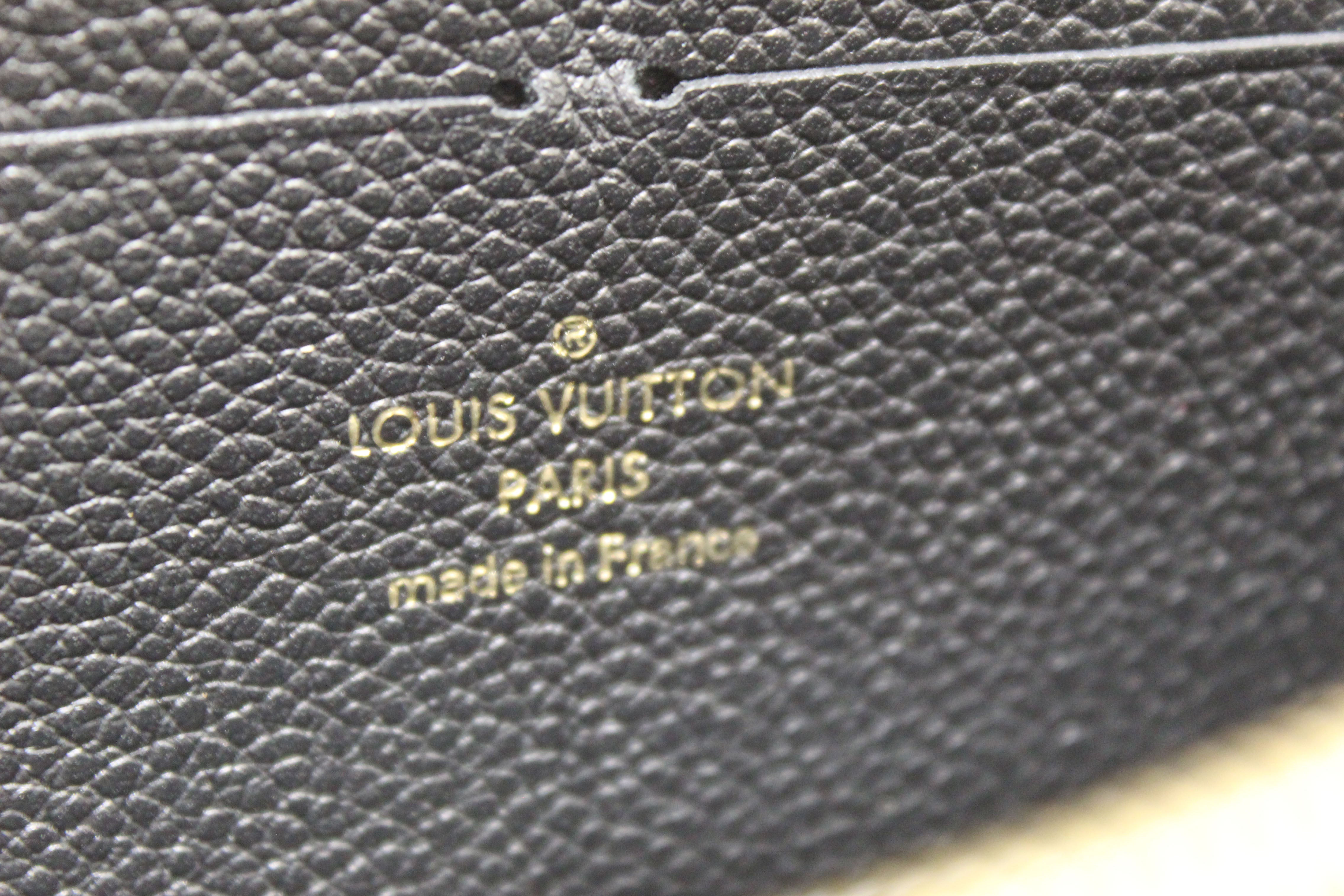 Authentic Louis Vuitton Black Monogram Empreinte Leather Zippy Wallet