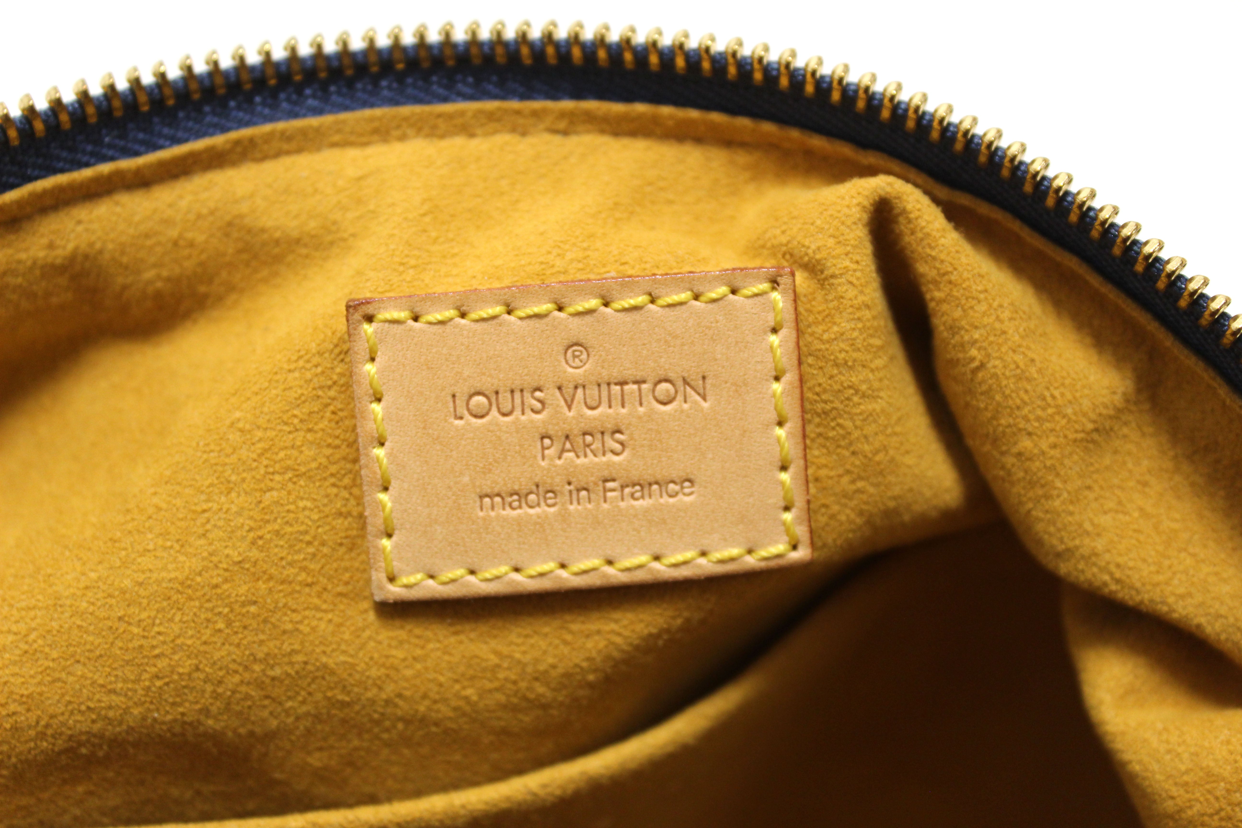 Authentic Louis Vuitton Blue Denim Monogram Baggy PM Shoulder Bag