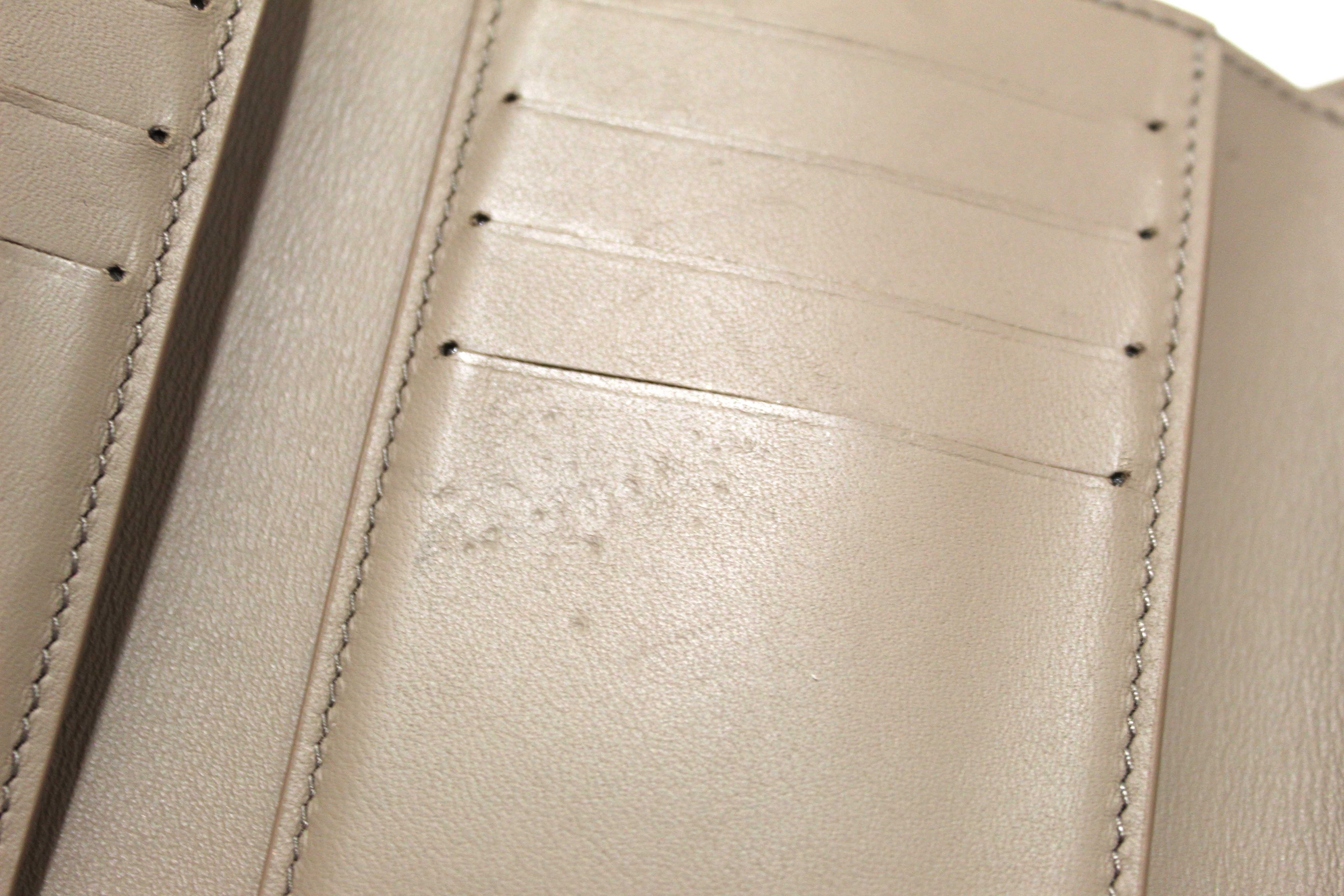 Authentic Louis Vuitton Magnolia Pink Taurillon Leather Capucines Compact Wallet