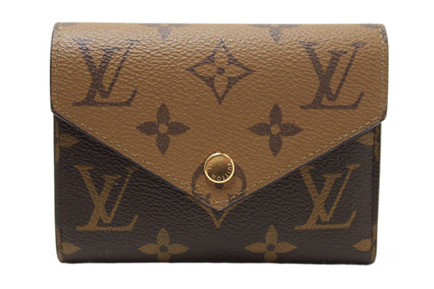 Authentic Louis Vuitton Classic Monogram and Monogram Reverse Canvas Victorine Wallet