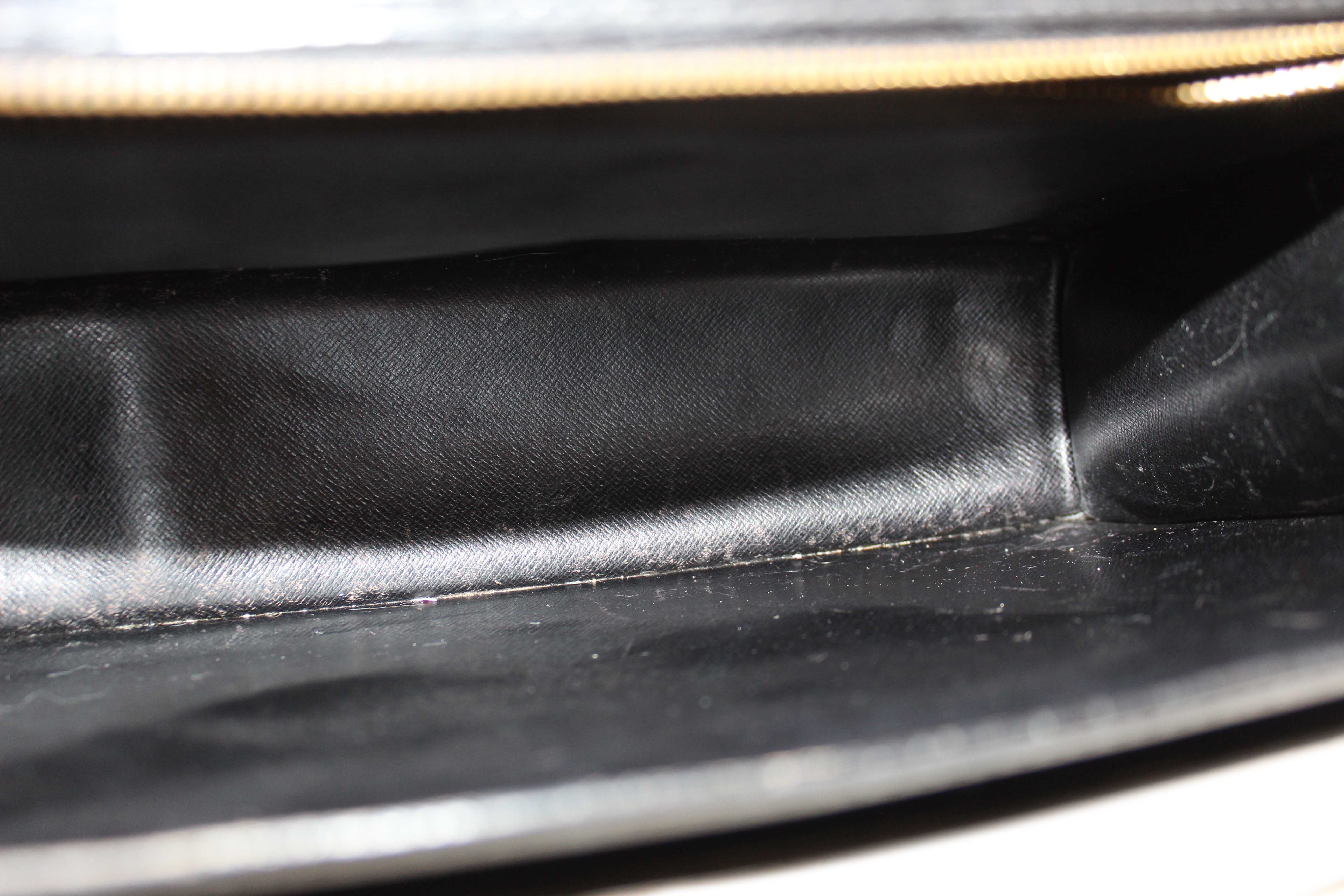 Authentic Louis Vuitton Black Epi Leather Monceau Bag