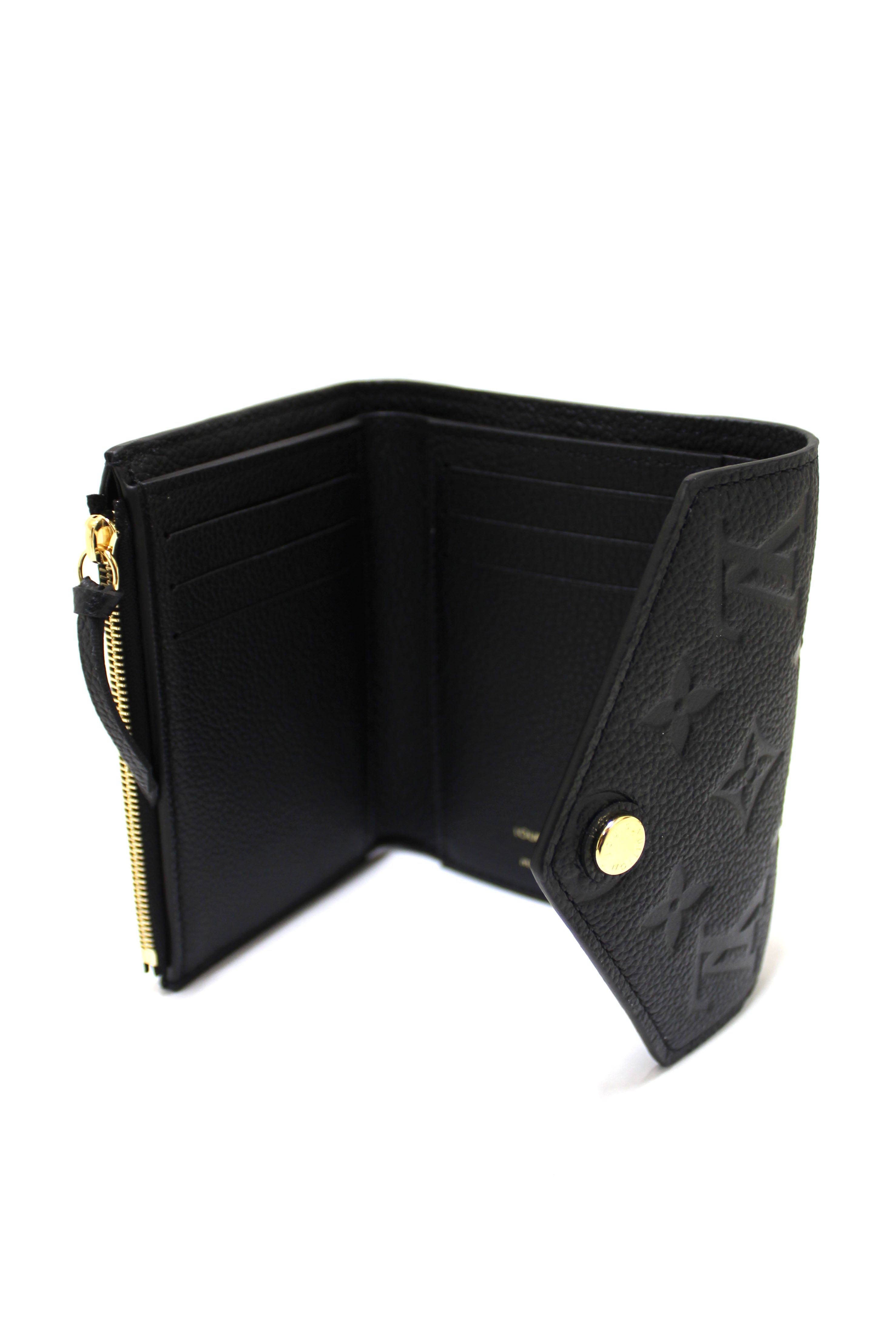 Authentic Louis Vuitton Black Monogram Empreinte Leather Victorine Wallet