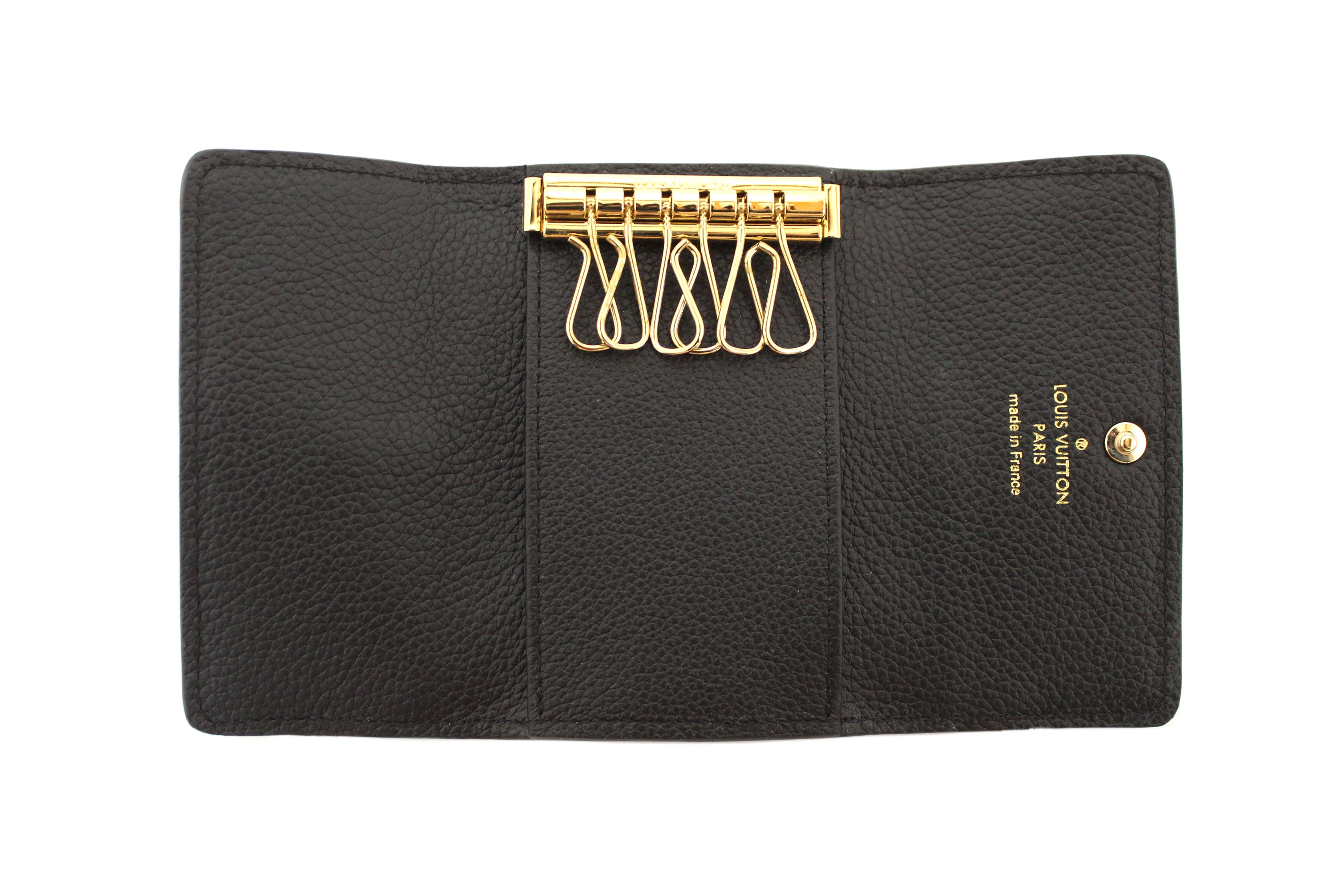 Authentic Louis Vuitton Black Monogram Empreinte Leather Key