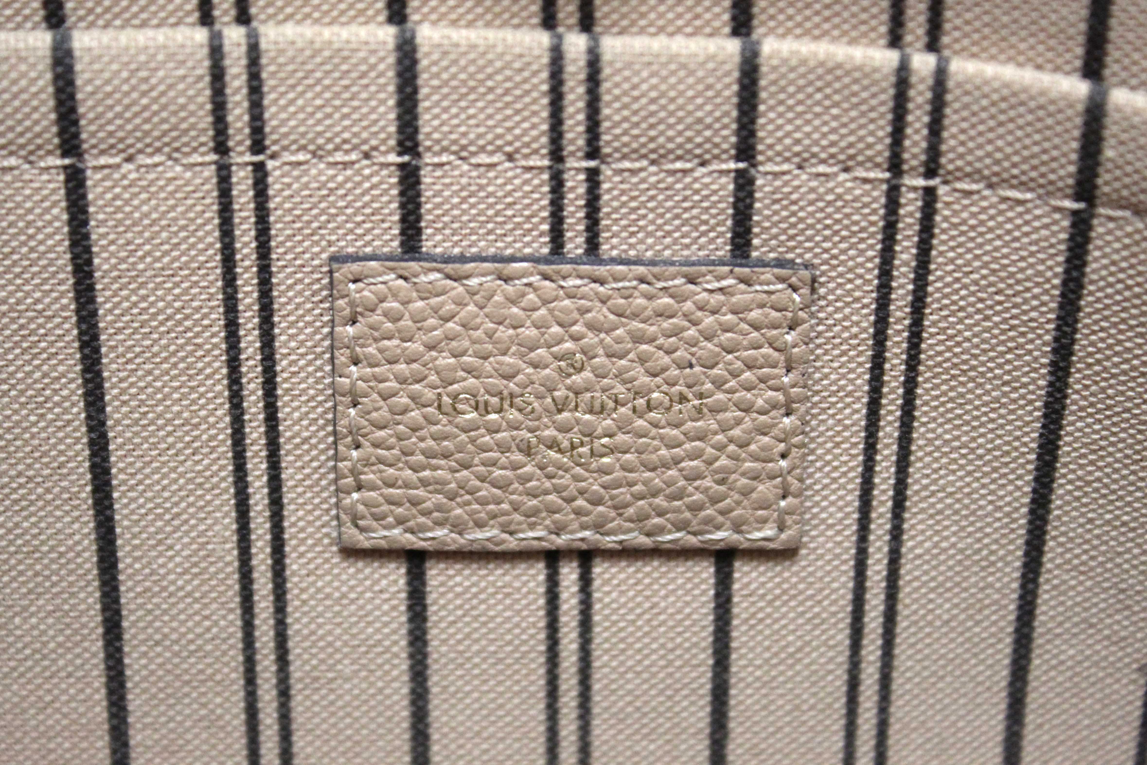 Authentic Louis Vuitton Beige Monogram Empreinte Leather Montaigne MM Bag