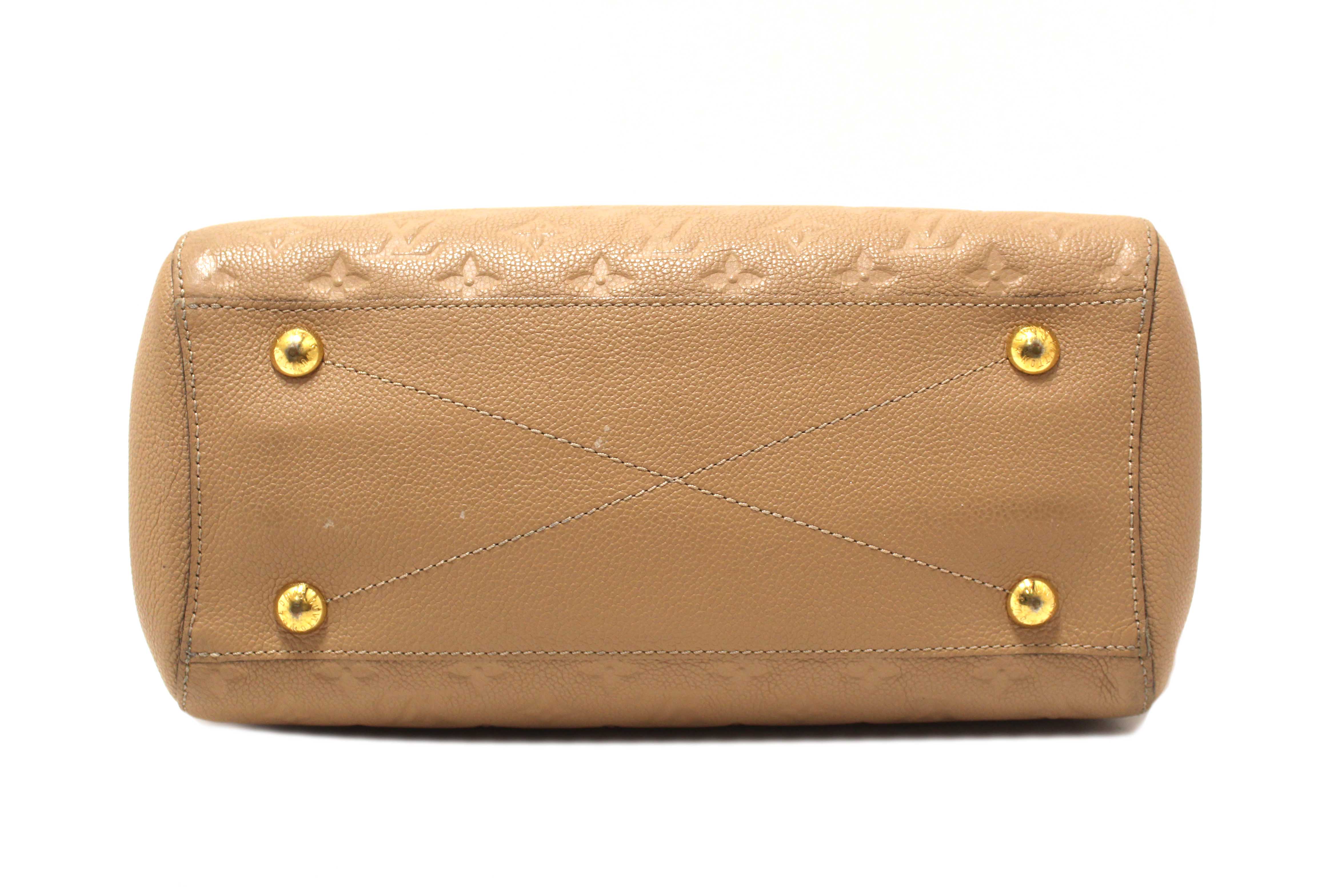 Authentic Louis Vuitton Beige Monogram Empreinte Leather Montaigne MM Bag