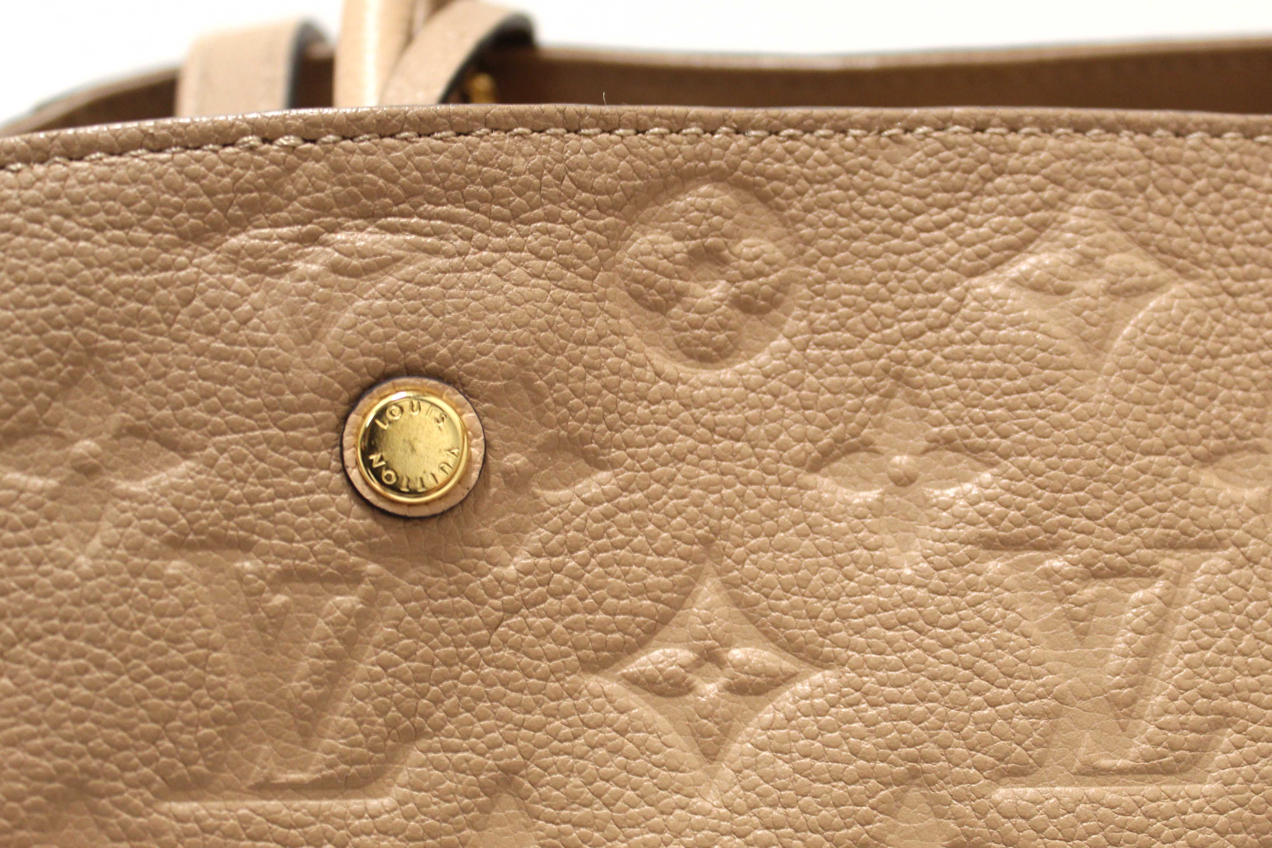 Authentic Louis Vuitton Beige Monogram Empreinte Leather Montaigne MM Bag