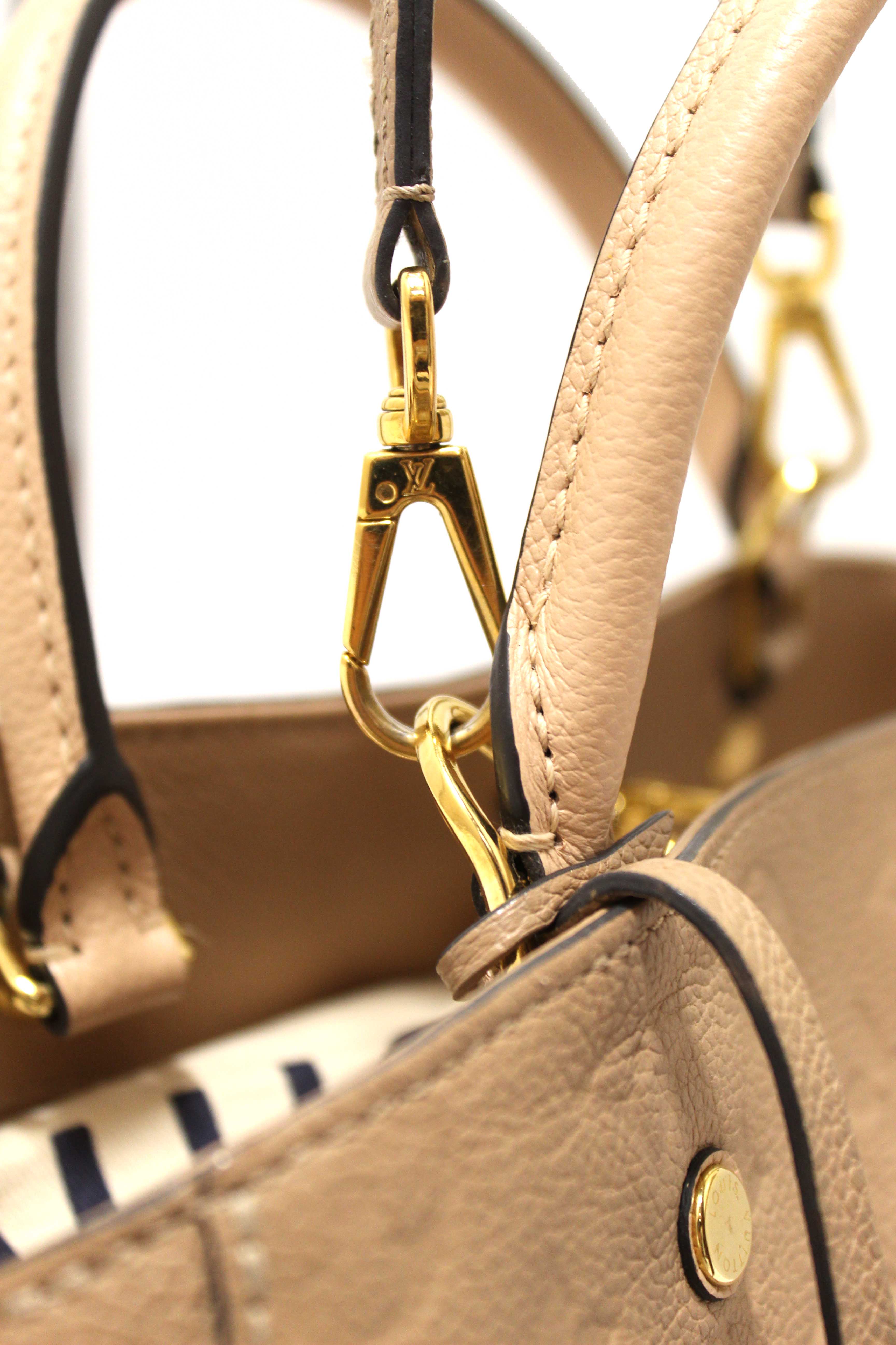 Authentic Louis Vuitton Beige Monogram Empreinte Leather Montaigne MM Bag