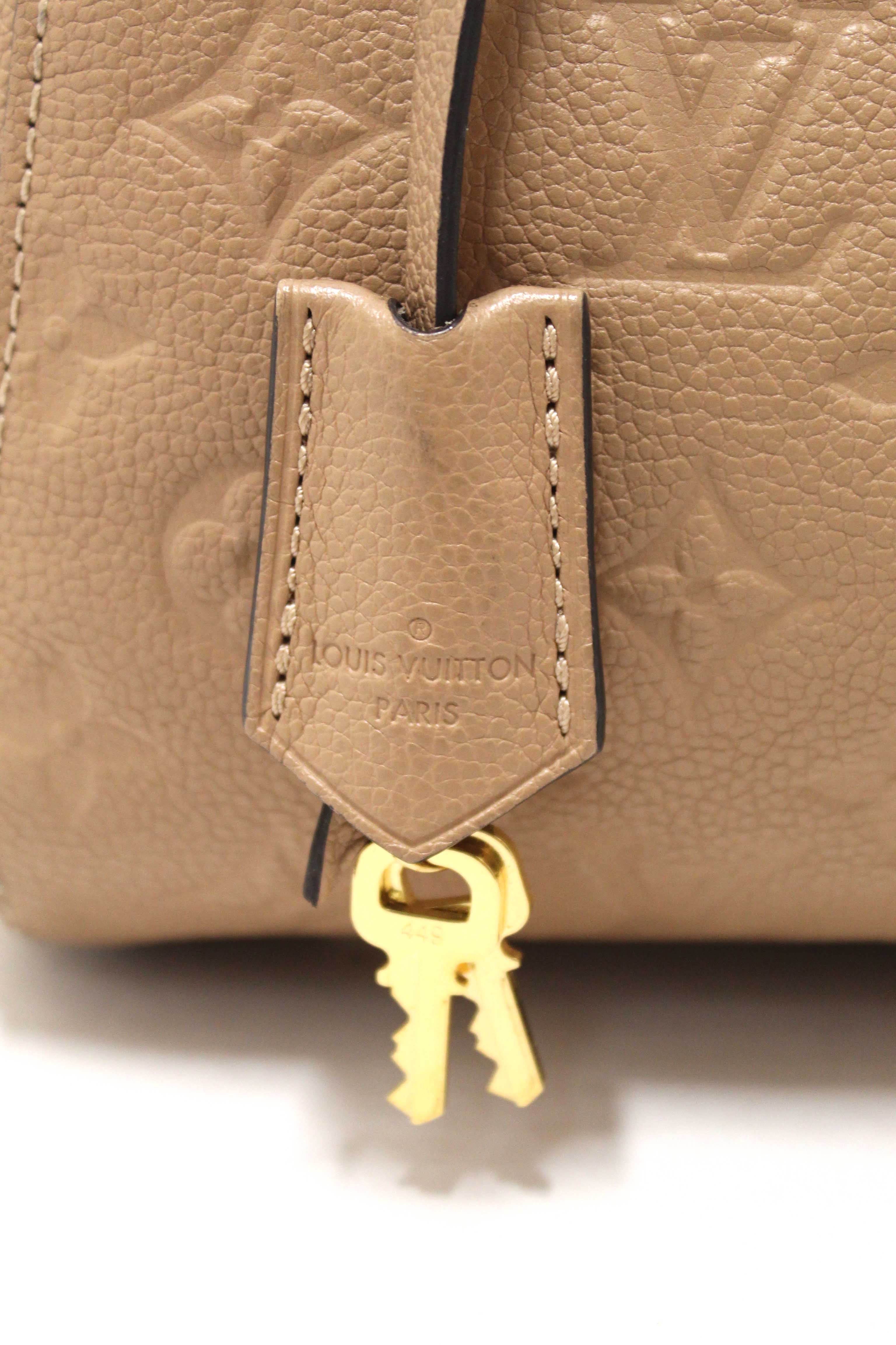 Authentic Louis Vuitton Beige Monogram Empreinte Leather Montaigne MM Bag