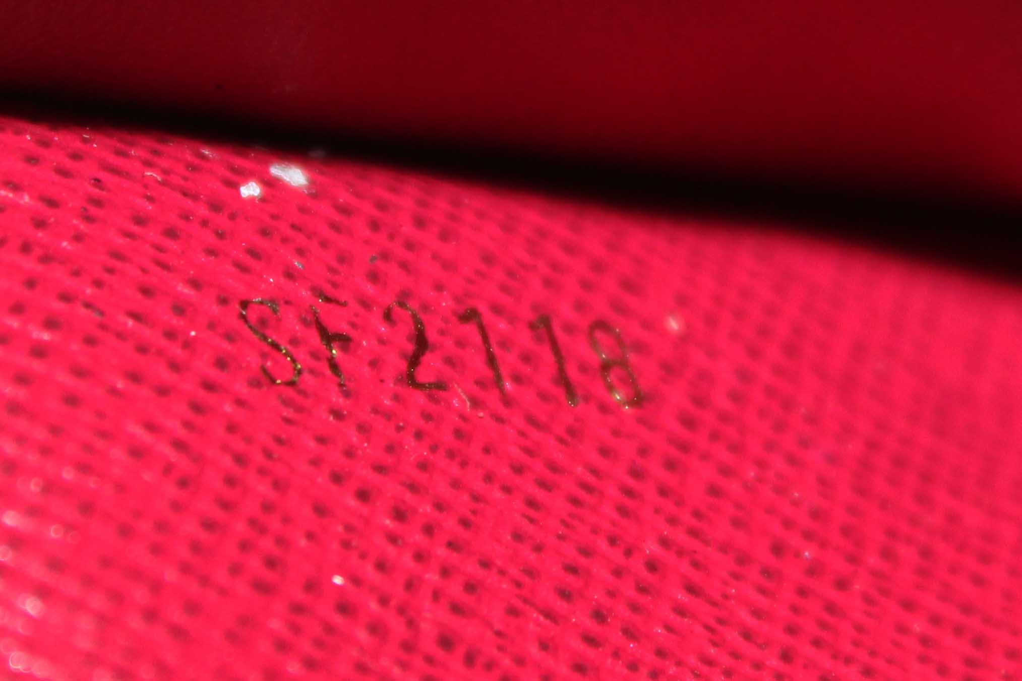 Authentic Louis Vuitton Classic Monogram Canvas with Fuchsia Leather Adele Wallet