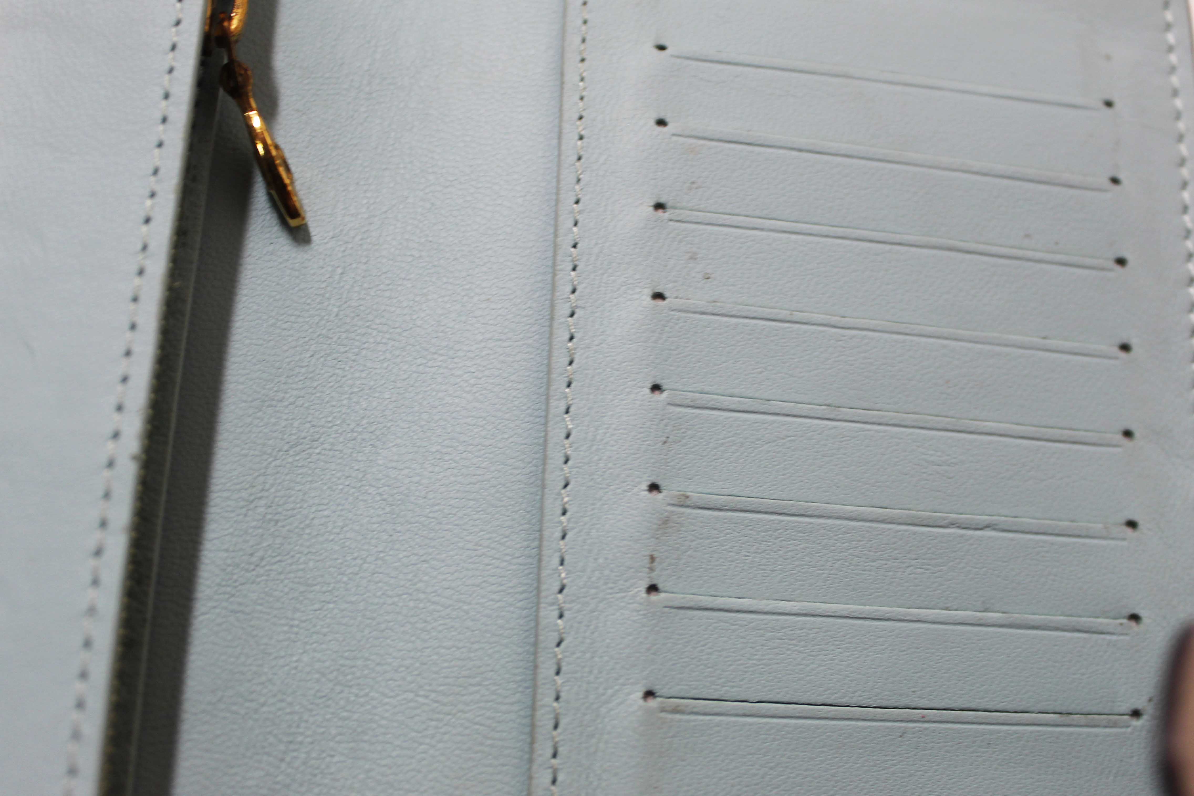 Authentic Louis Vuitton Galet Grey Grained Taurillon Leather LV Vertical Wallet