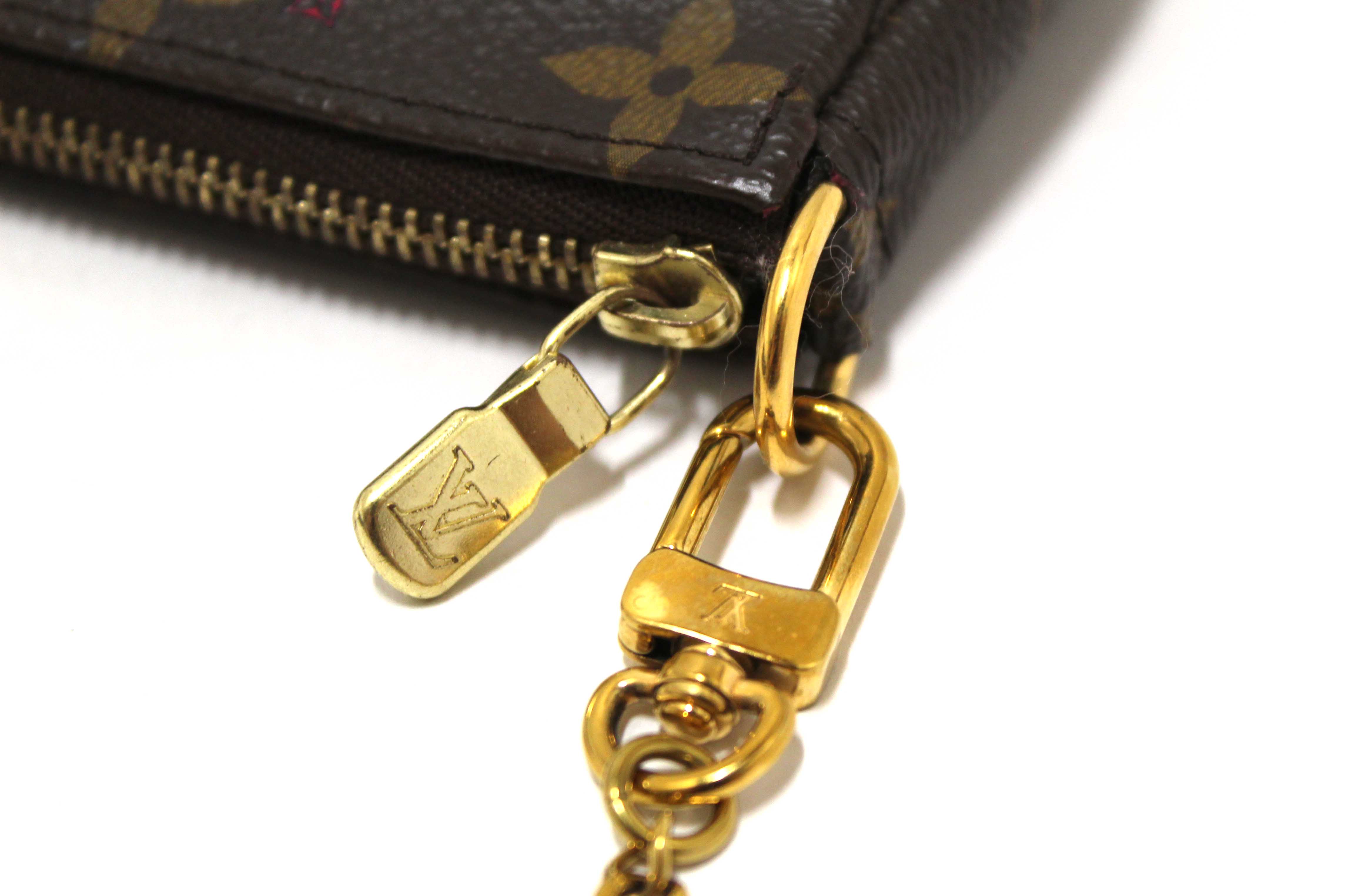 Authentic Louis Vuitton Limited Edition Monogram Animation Roller Coaster Mini Pochette Accessories Bag