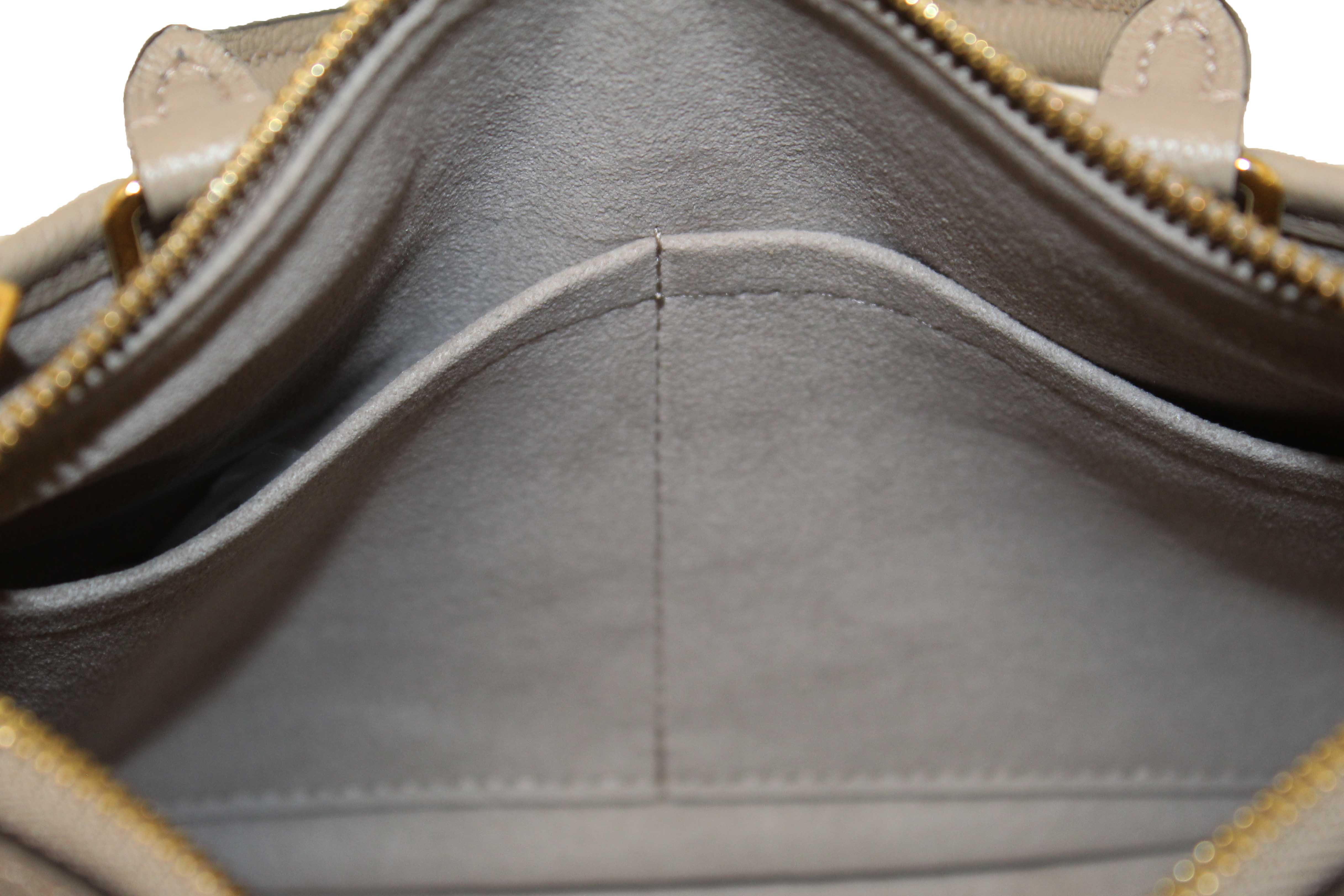 Authentic Louis Vuitton Tourterelle / Crème Beige Monogram Empreinte Leather Trianon PM Tote Bag