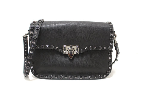 Authentic Valentino Garavani Black Grained Calfskin Rolling Rockstud Flap Crossbody Bag