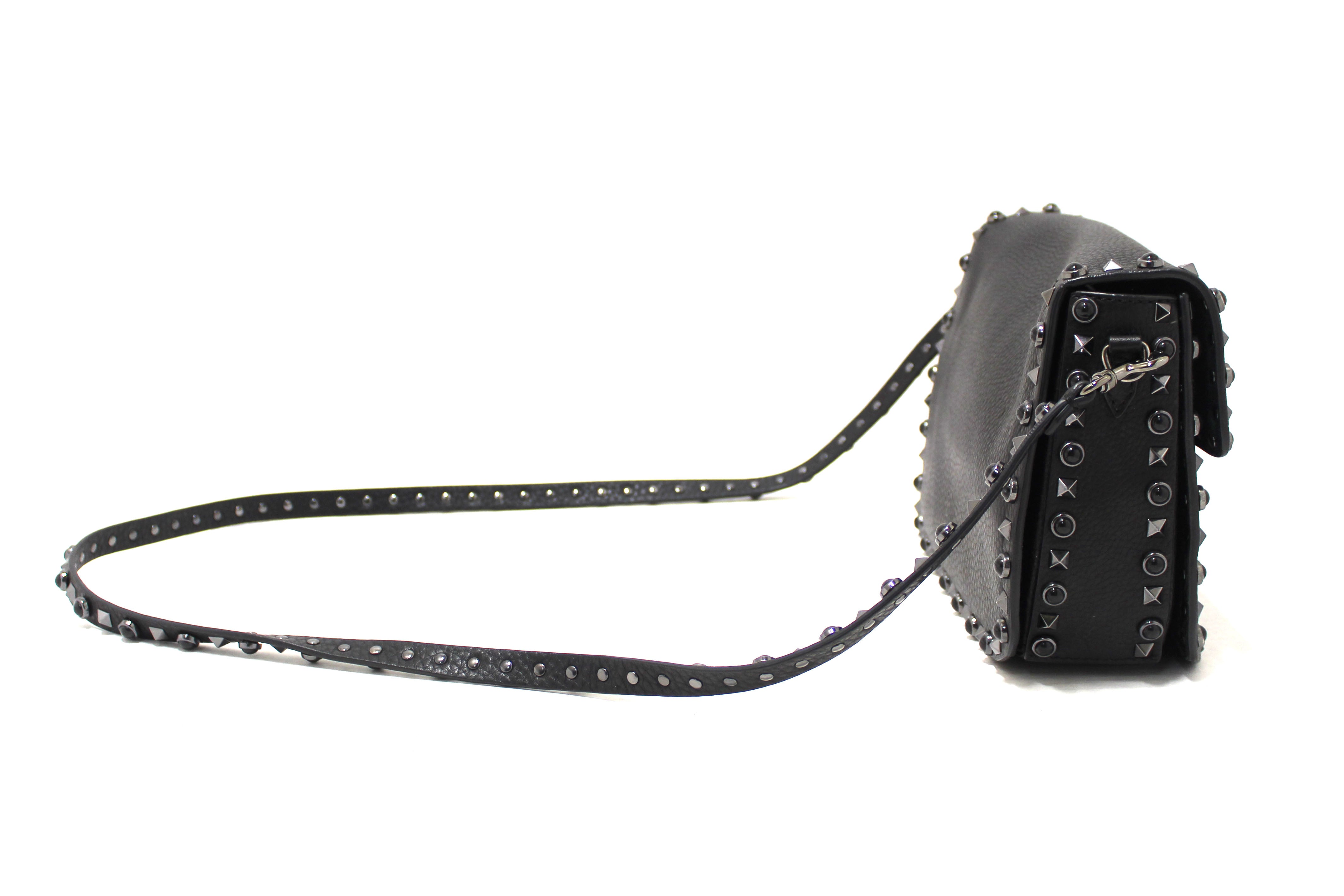 Authentic Valentino Garavani Black Grained Calfskin Rolling Rockstud Flap Crossbody Bag