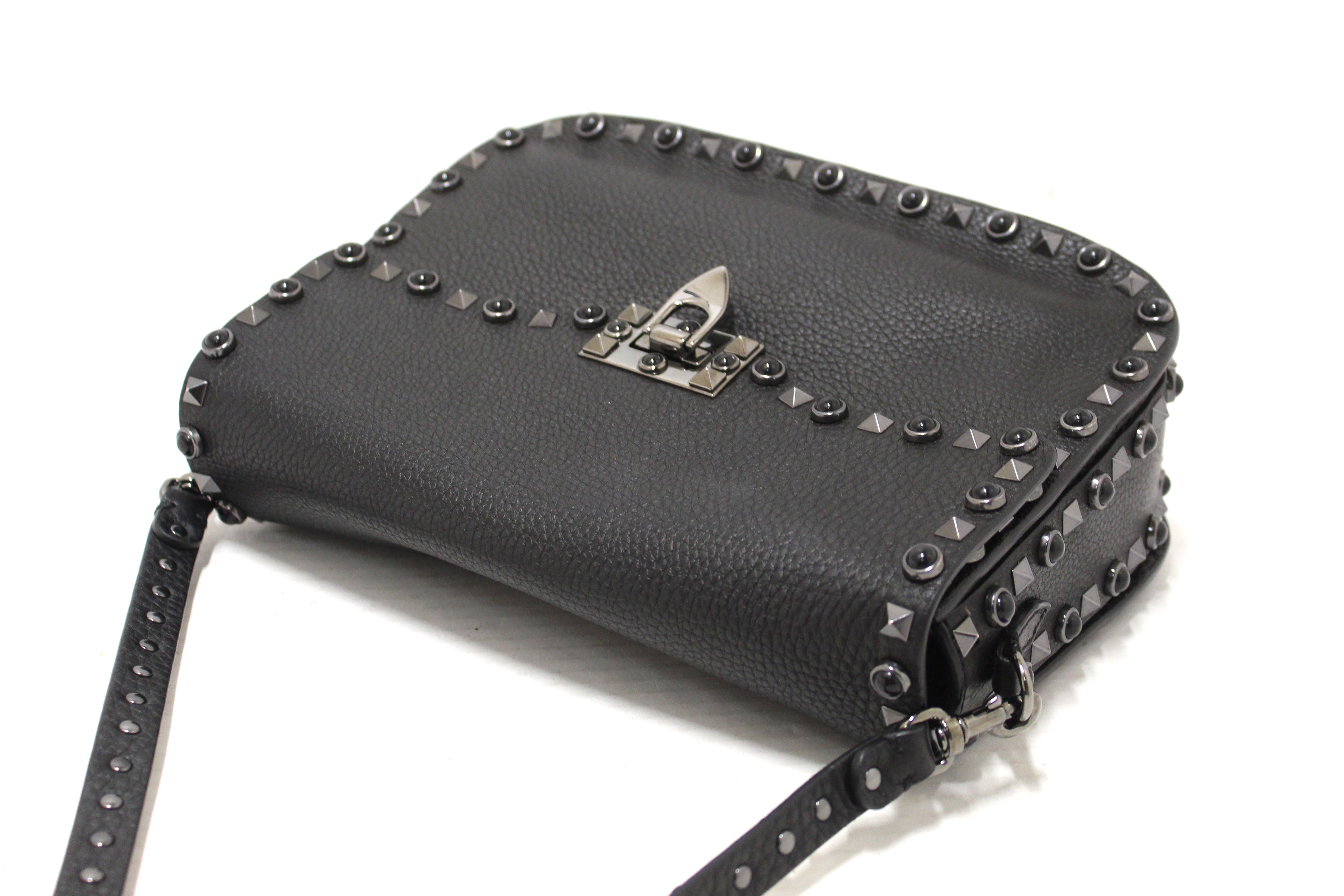 Authentic Valentino Garavani Black Grained Calfskin Rolling Rockstud Flap Crossbody Bag