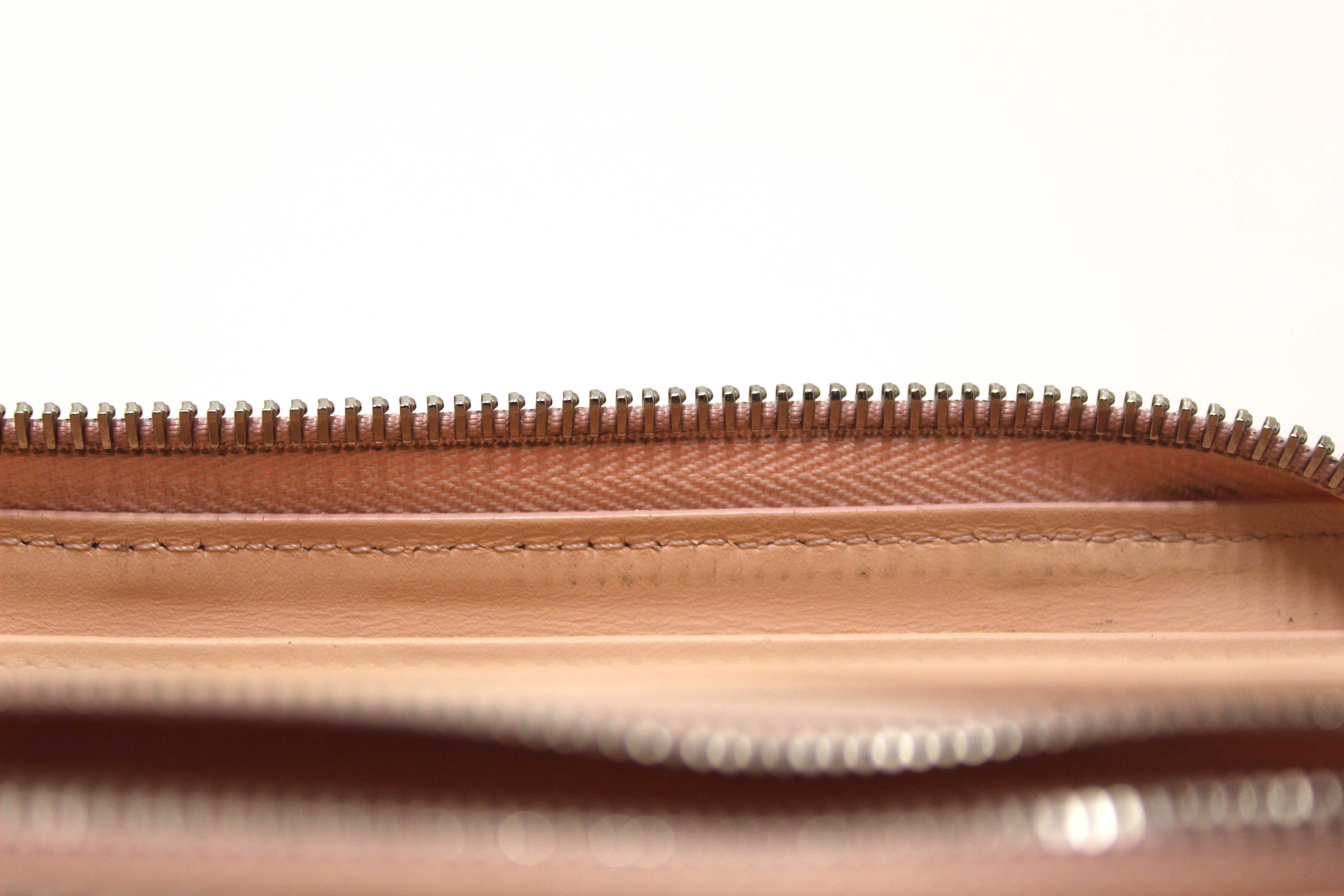 Authentic Louis Vuitton Pink Mahina Leather Zippy Wallet