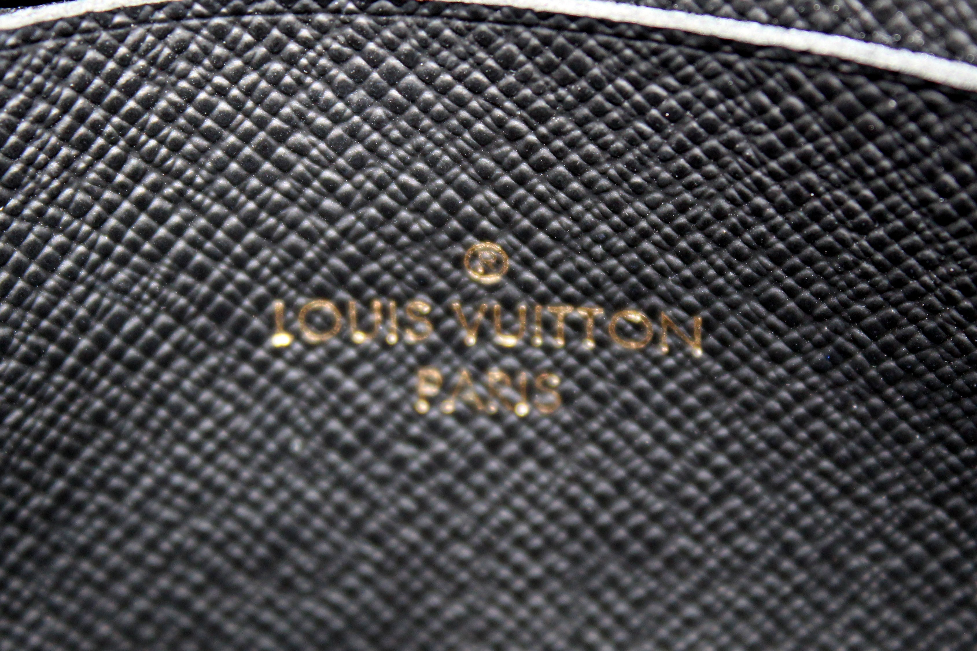 Authentic Louis Vuitton Monogram Giant Reverse and Monogram Canvas Double Zip Pochette Bag