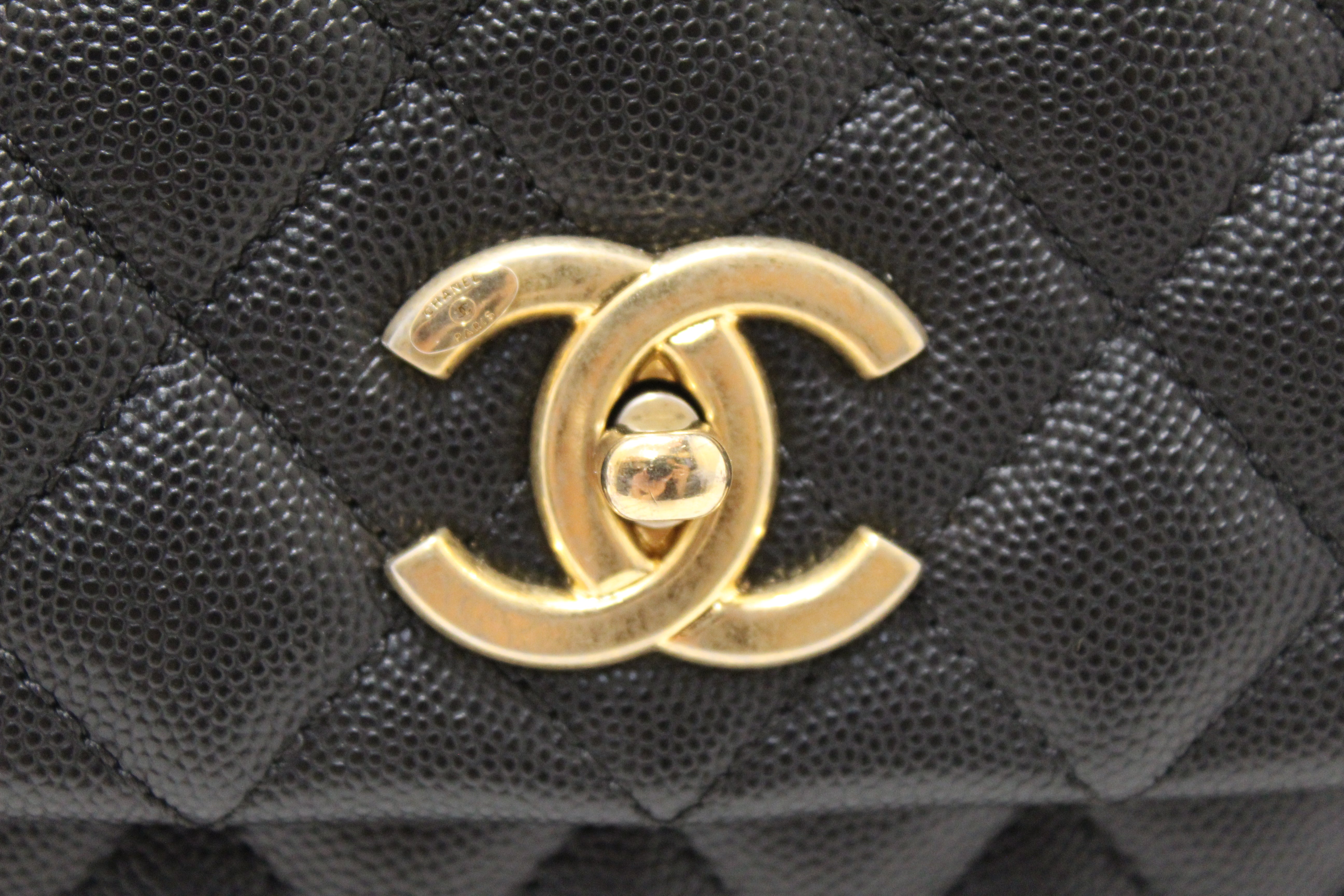 Authentic Chanel Black Quilted Caviar Leather Maxi Flap Bag with Top Handle Bag